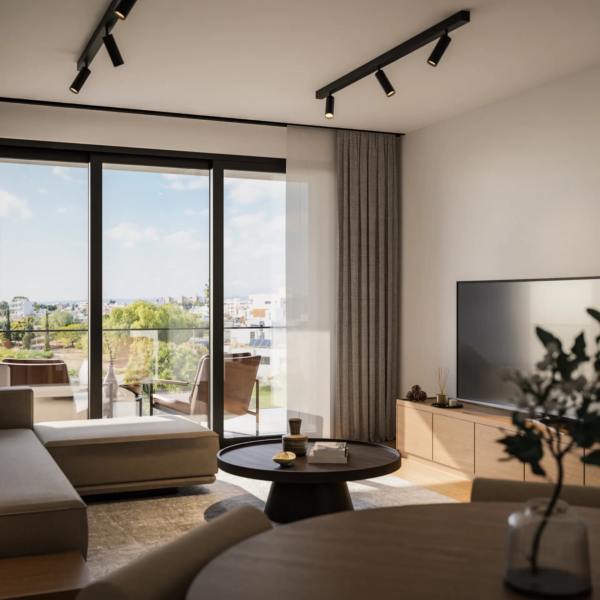 ACHILLEAS living room opening onto a balcony with views over Mesa Geitonia