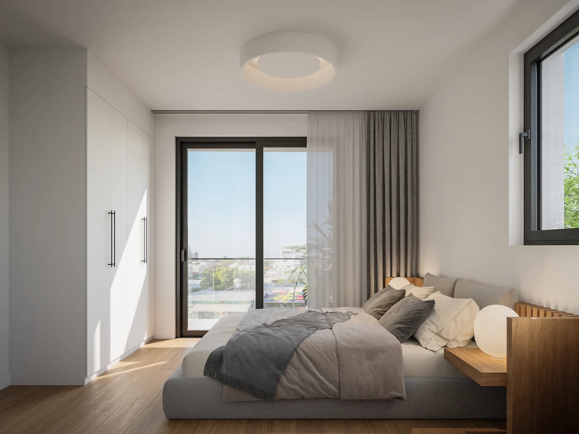 ACHILLEAS bedroom with a built-in wardrobe and a glass door to the balcony