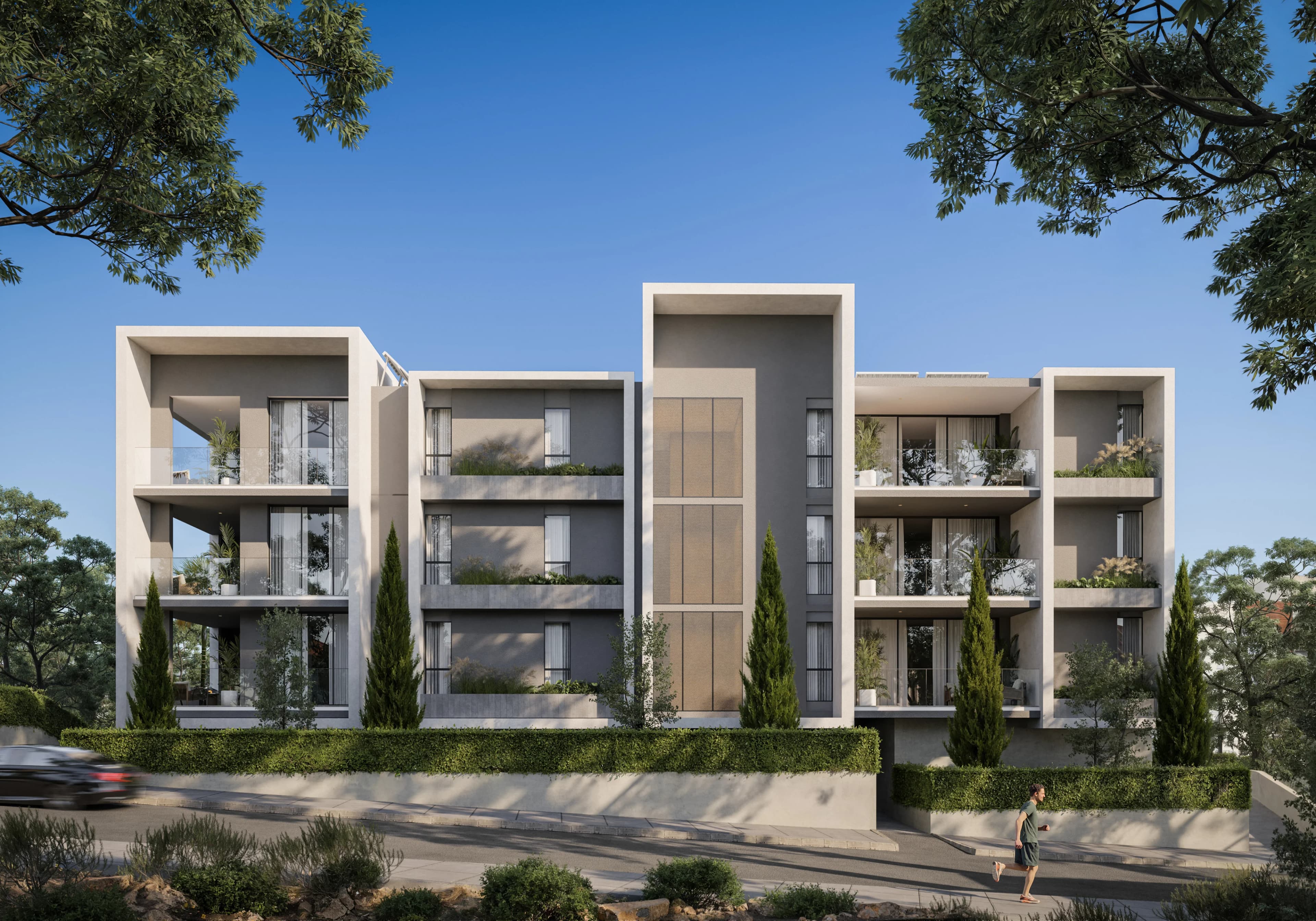 AETHER's front facade with framed balconies above a planted wall