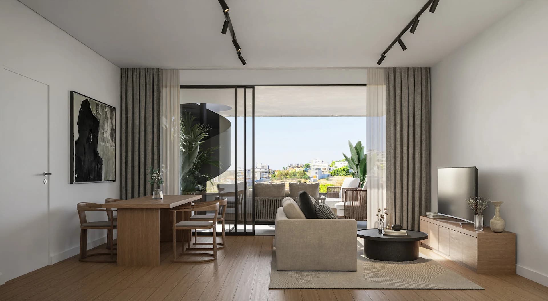 ALDO living and dining room opening onto a covered balcony
