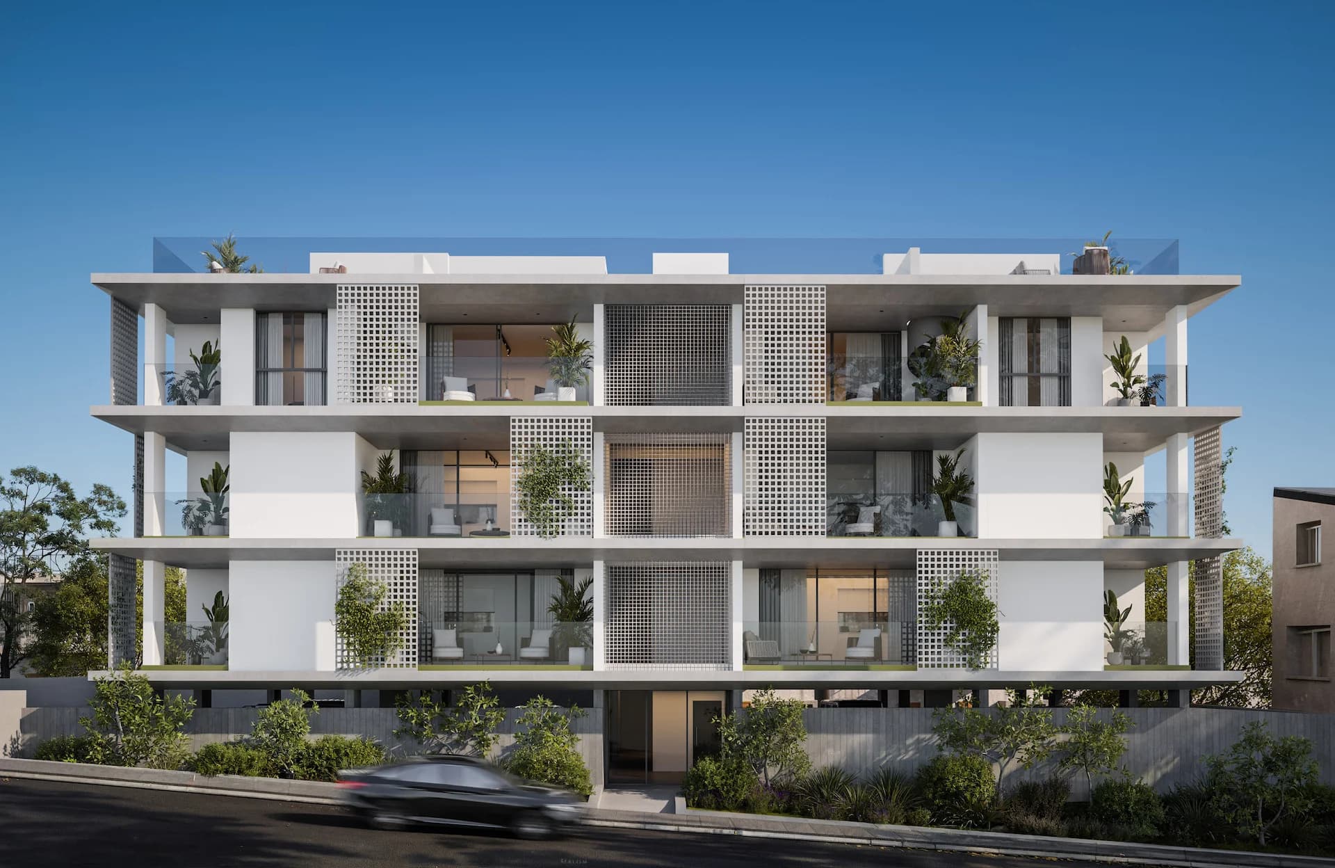 AURA's front facade with framed balconies and perforated screens