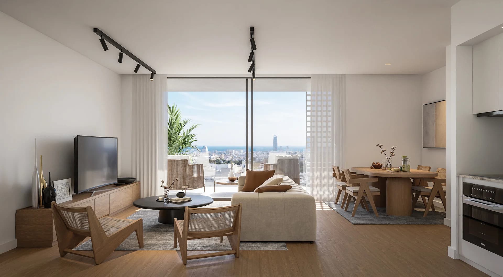 AURA living and dining room with a view out to the sea