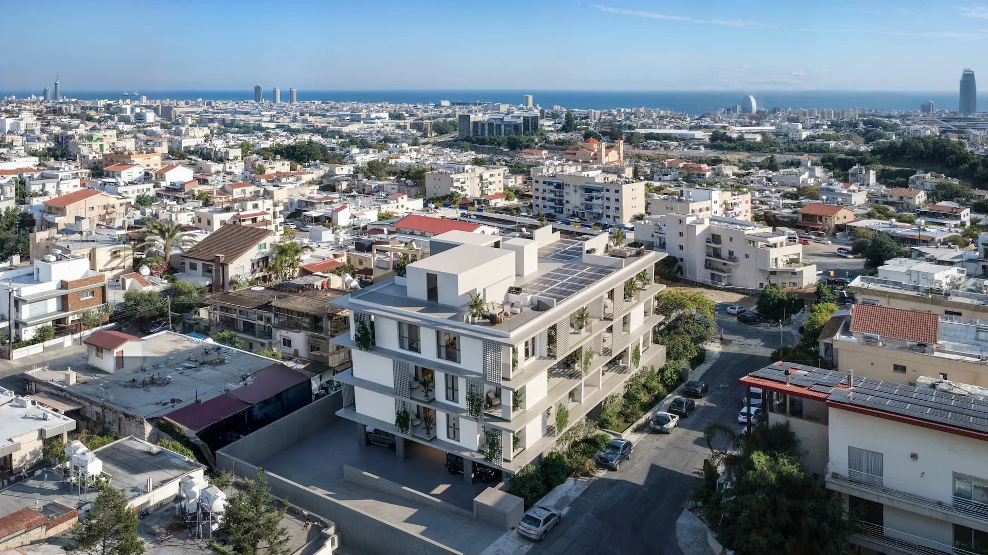 Aerial view of AURA in Agios Athanasios, Limassol running down to the sea