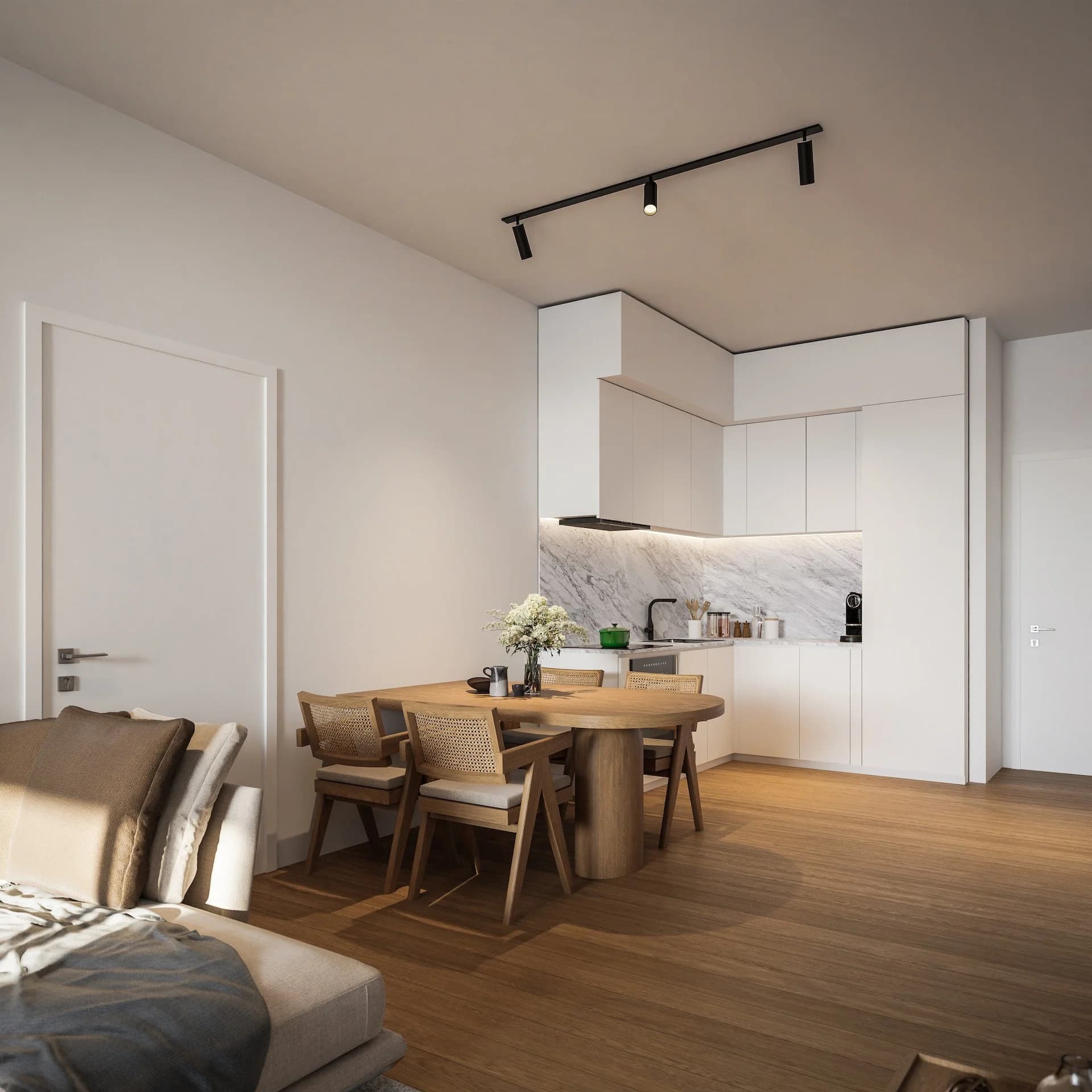 DELOMA kitchen with a marble splashback and a round dining table