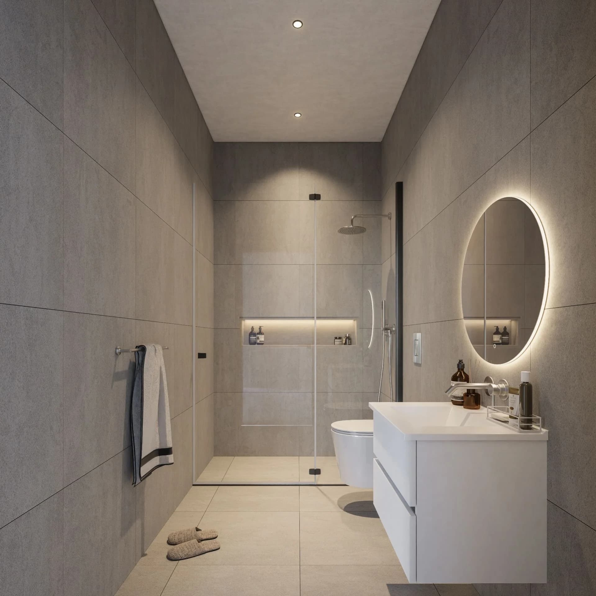 KABU shower room with an oval backlit mirror
