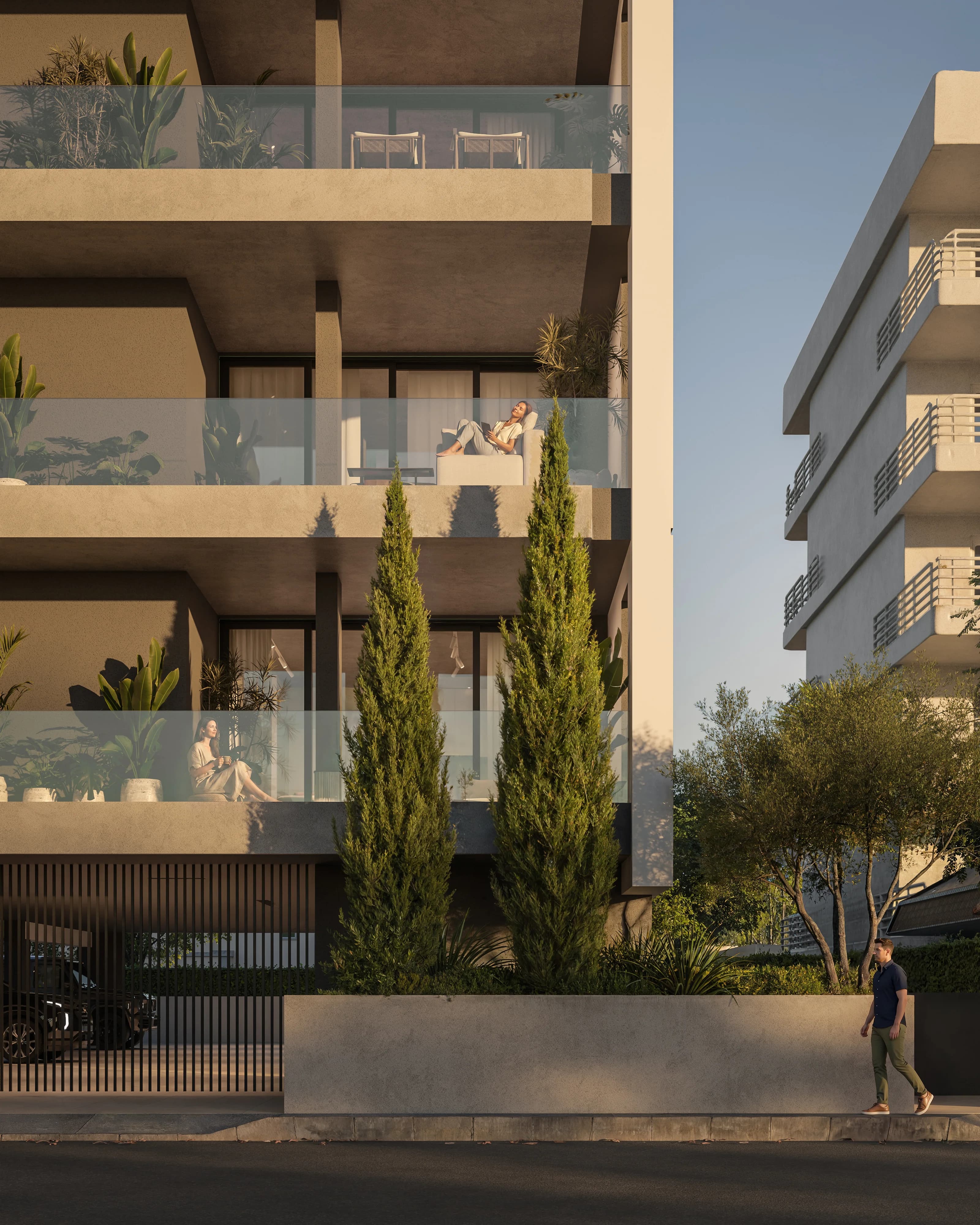 KAI's glass-fronted balconies framed by tall cypress trees
