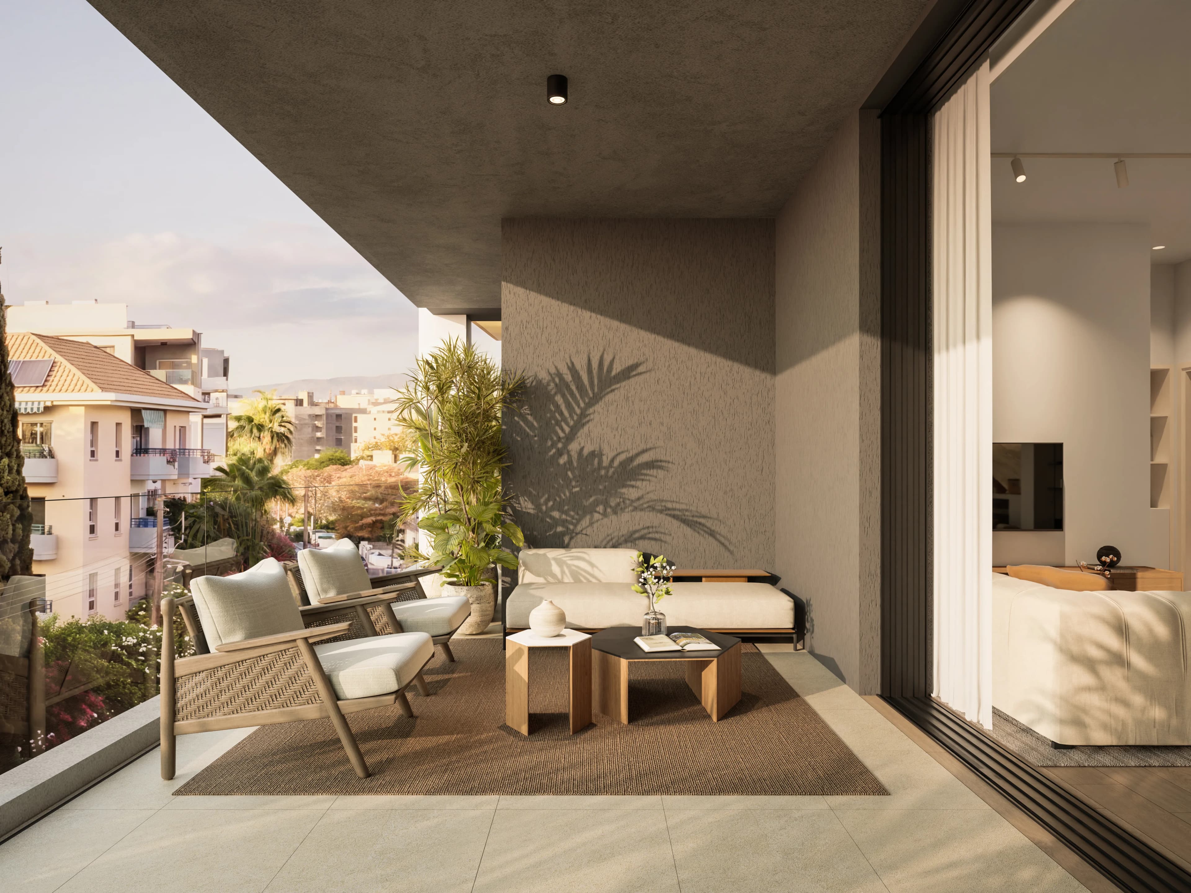 Covered KAI veranda with lounge chairs, overlooking the neighbouring houses