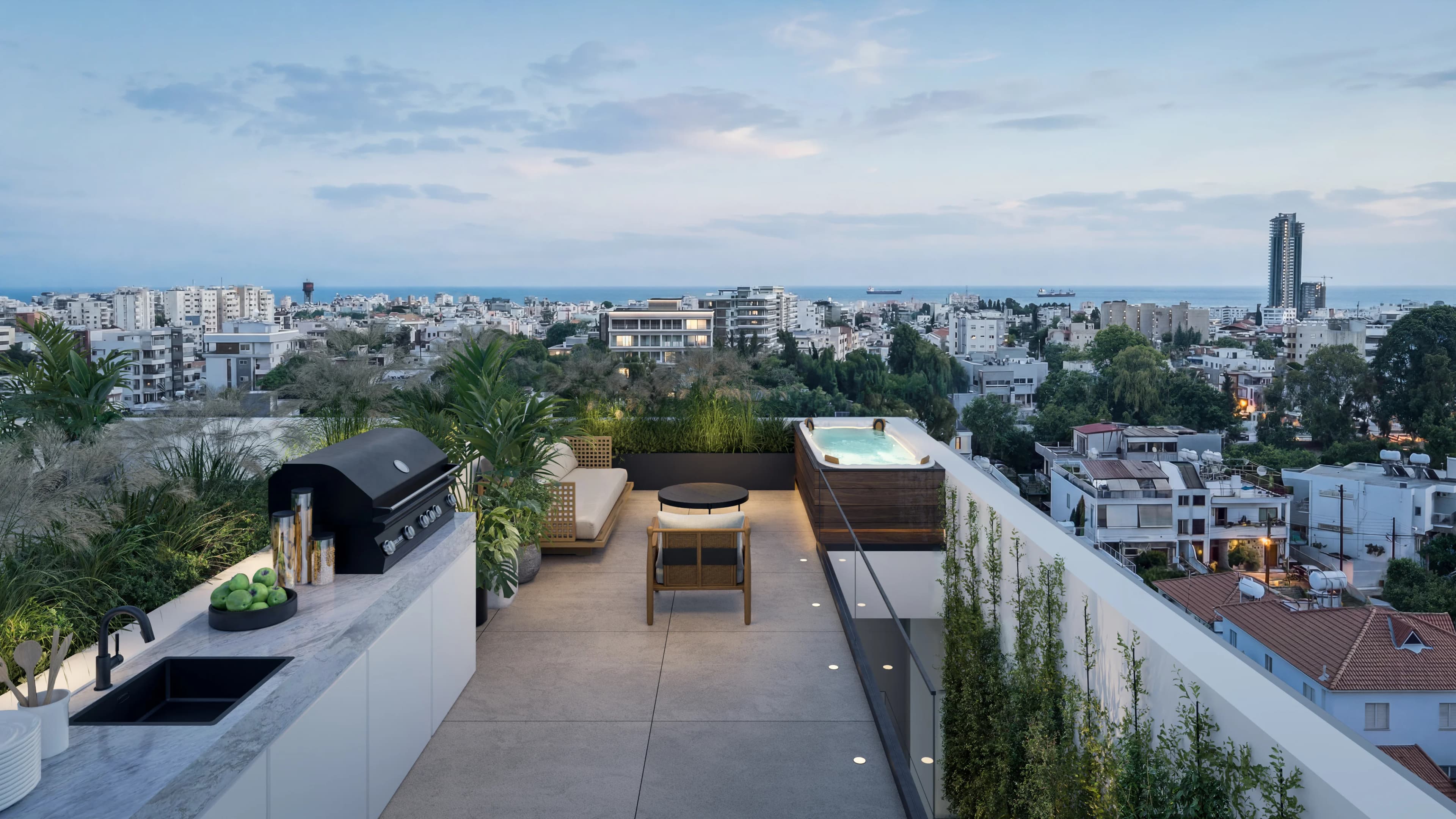 KAIA roof terrace looking over Germasogeia to Limassol's towers and the sea