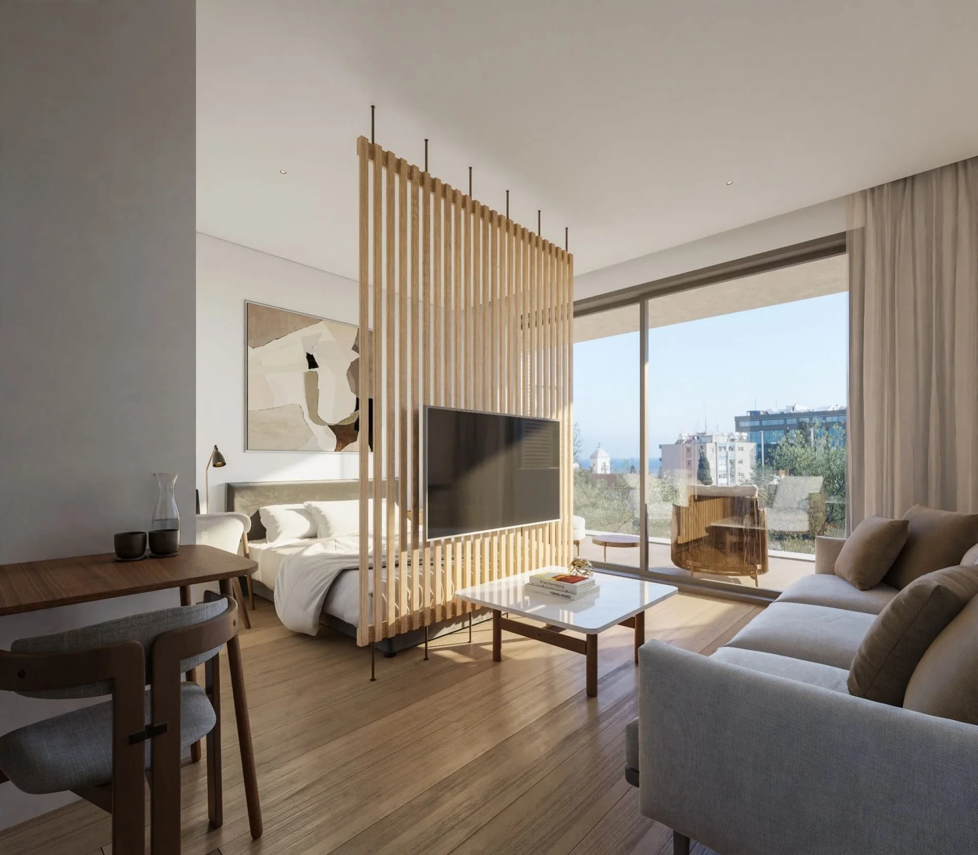 KYMA studio with a slatted timber divider and a view to the sea