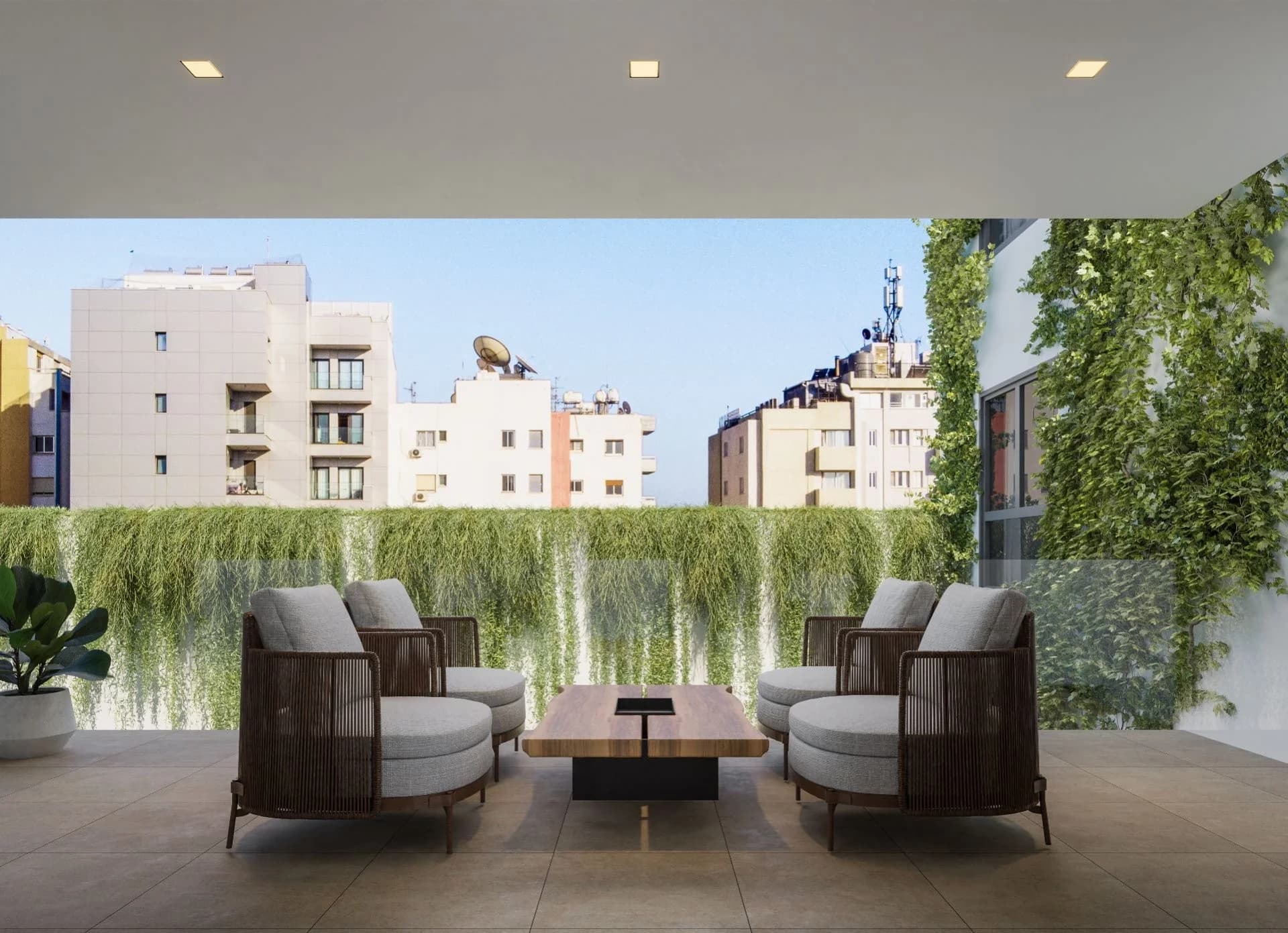 KYMA terrace lounge behind a curtain of hanging plants