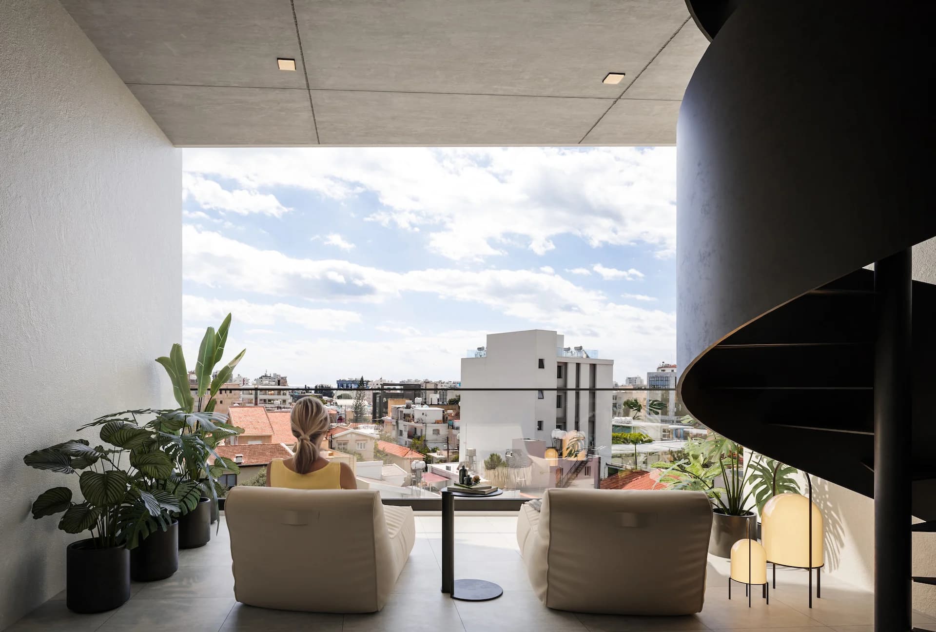 Covered LAV terrace with a spiral stair, overlooking the rooftops