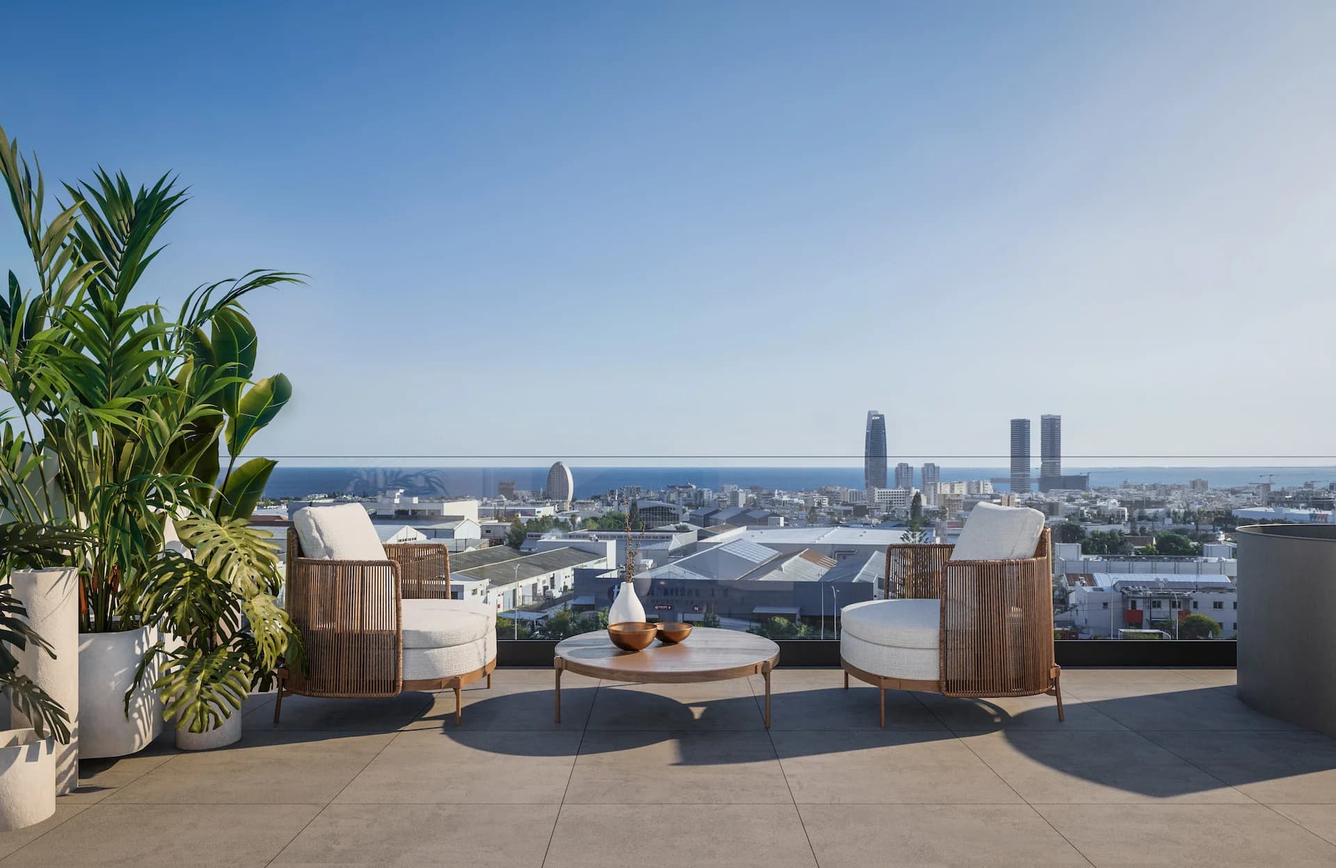 LENNOX roof terrace with lounge chairs and views to the sea