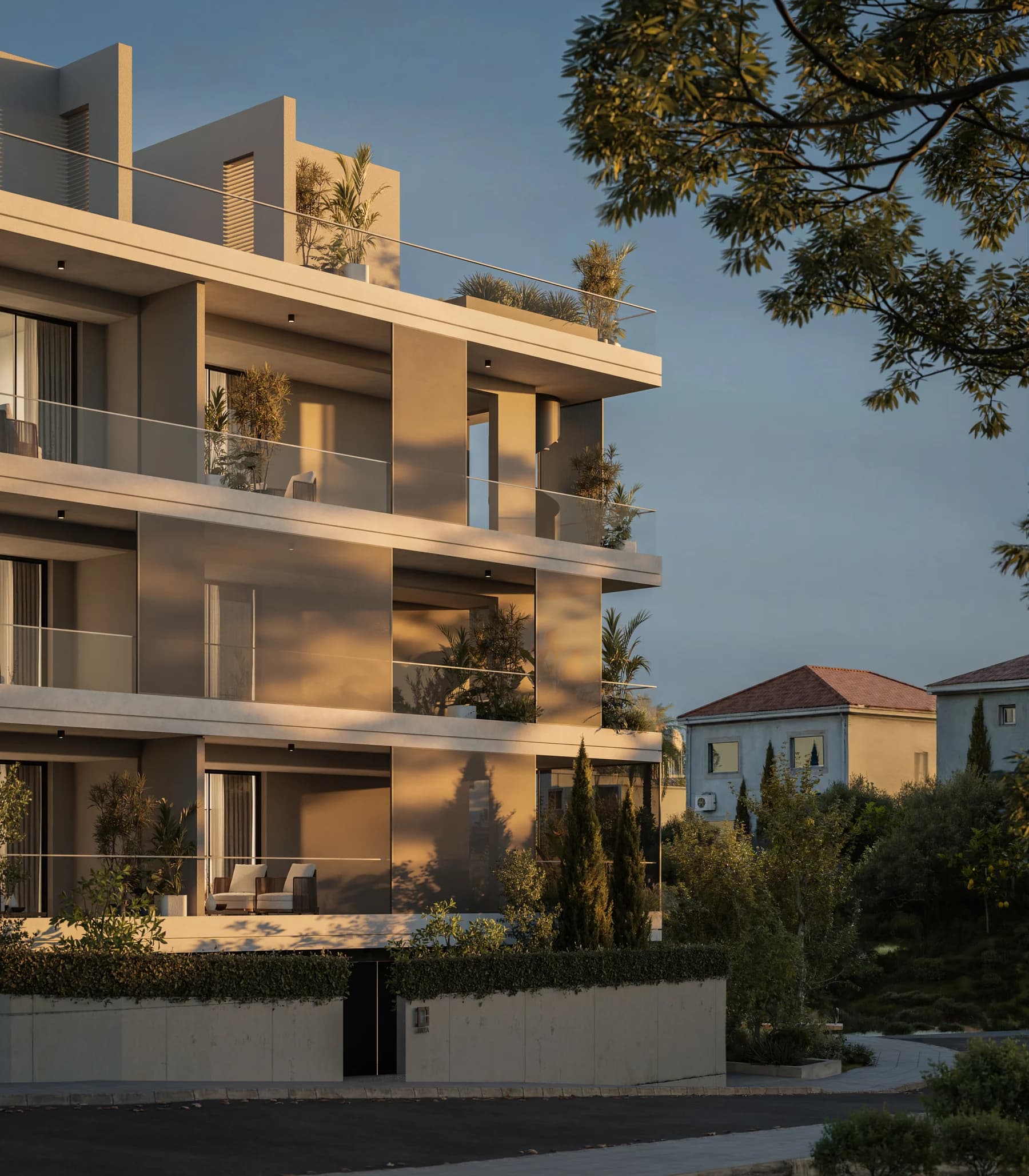 NAYA's balconies with glass railings in the late afternoon sun