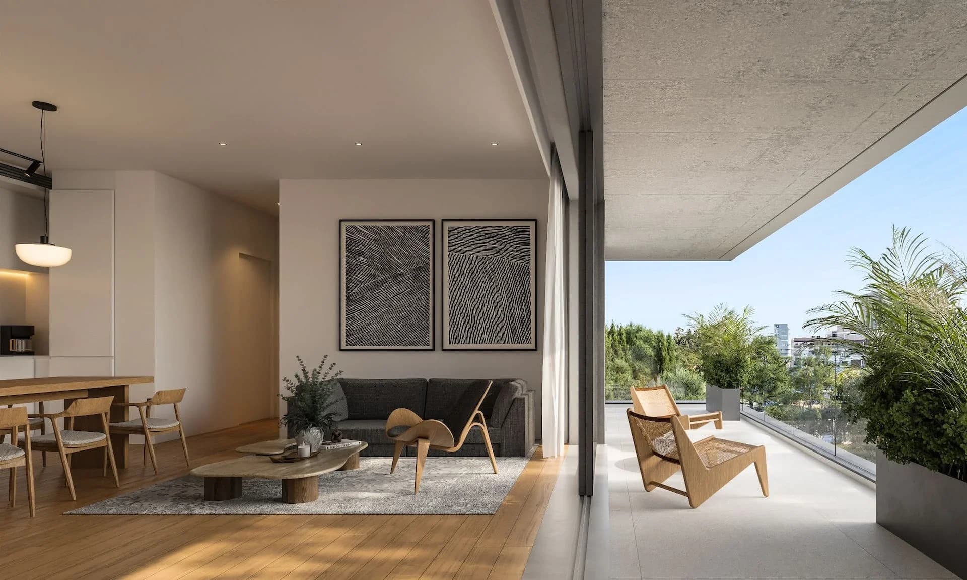 NEVE living room opening onto a wide balcony with lounge chairs and planting