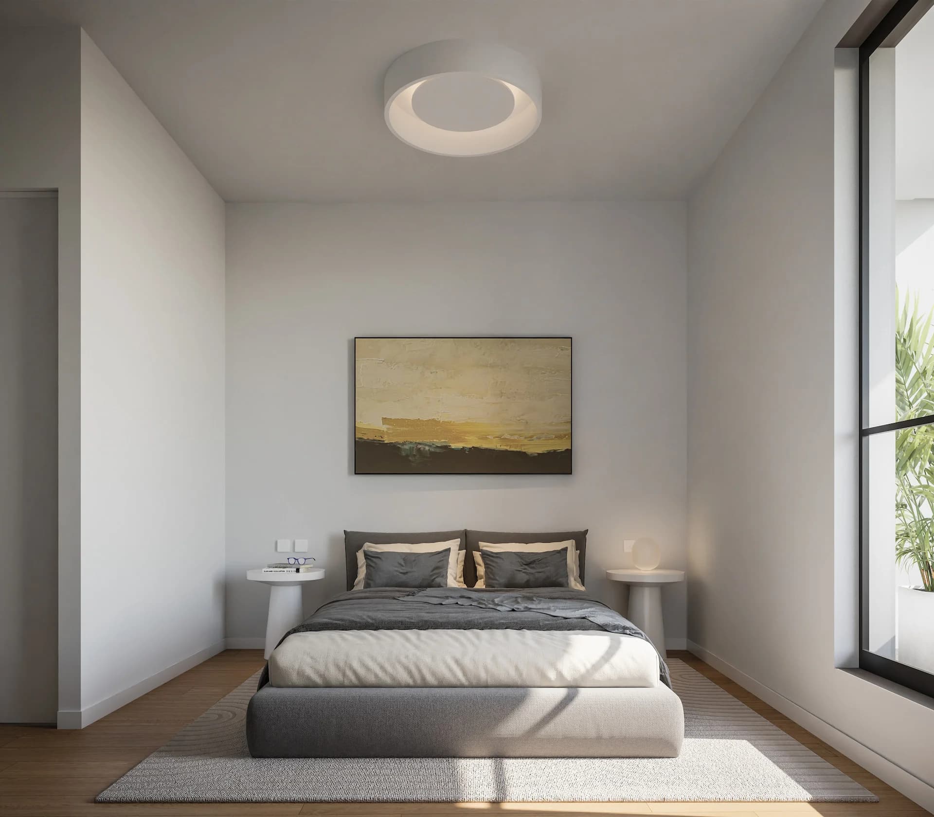 NOA bedroom with a sunset painting and a tall window