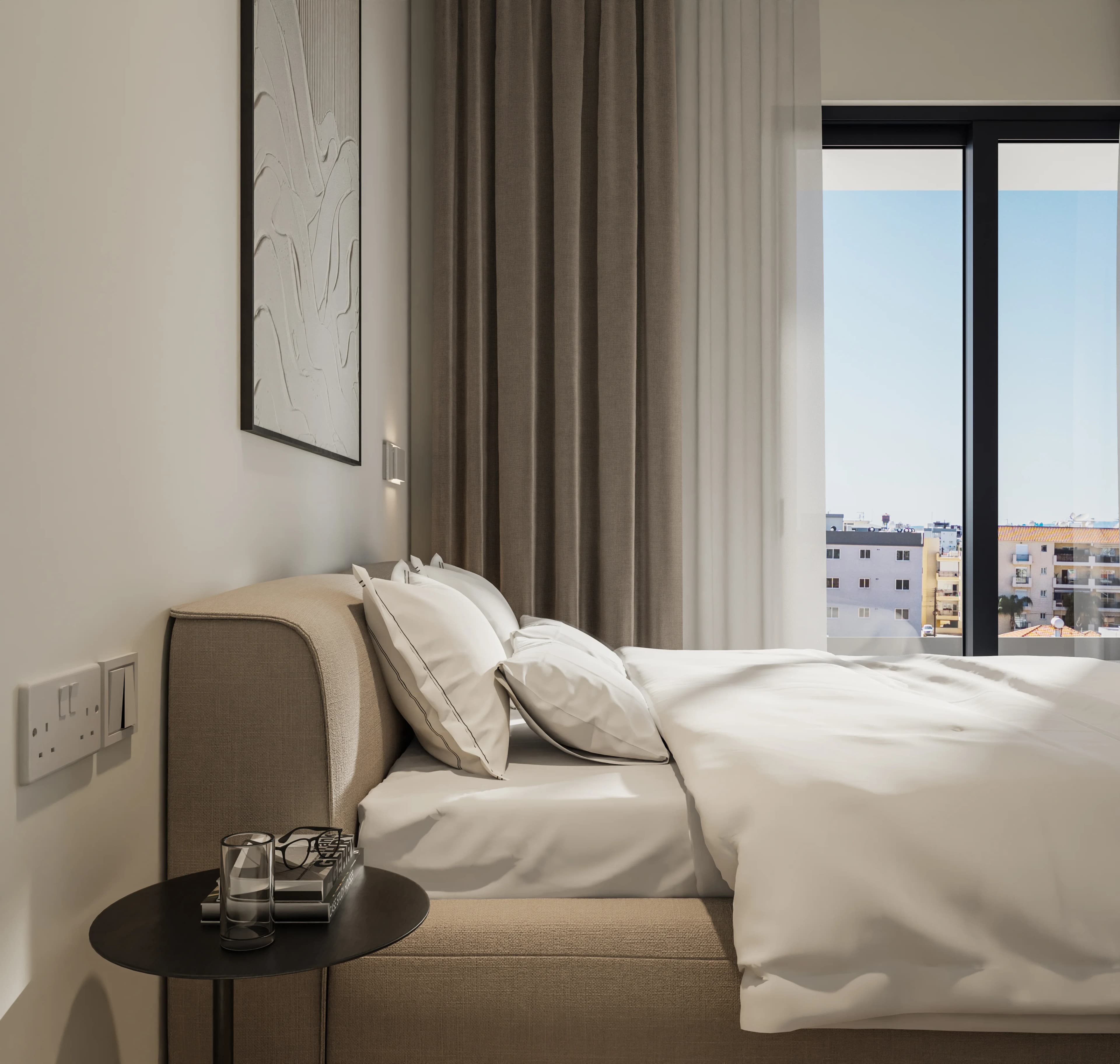 OLIVEA bedroom with an upholstered bed beside full-height glass