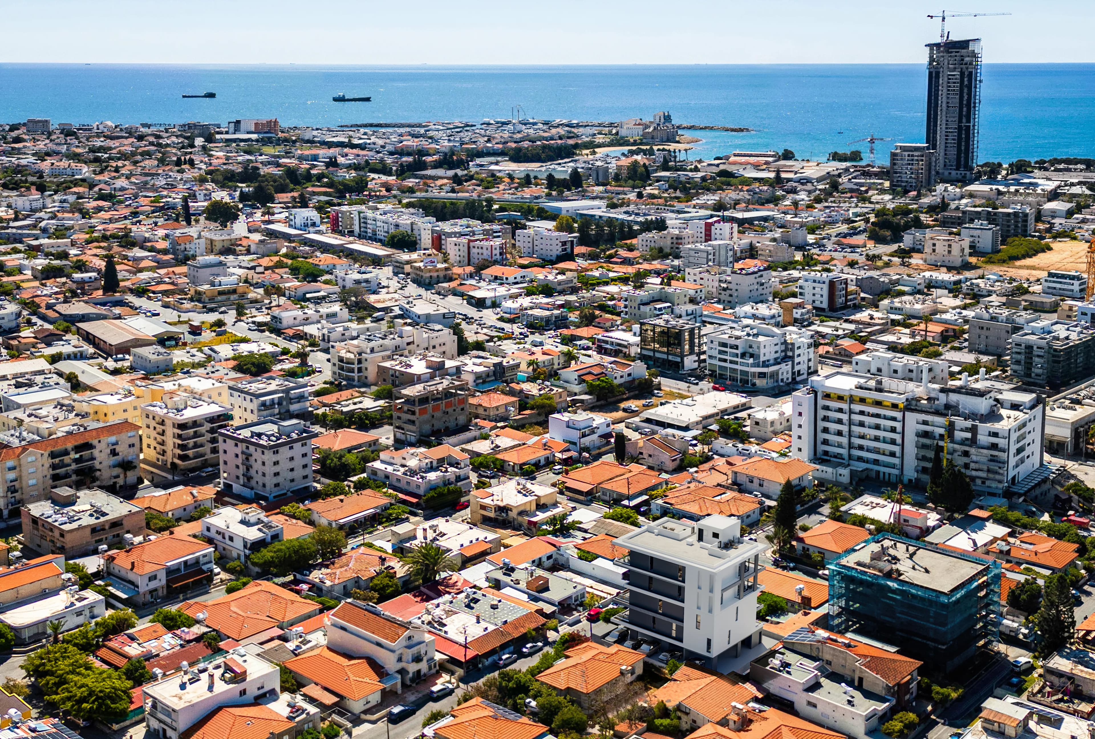 Aerial view of OLIVEA in Agios Ioannis, Limassol running down to the sea