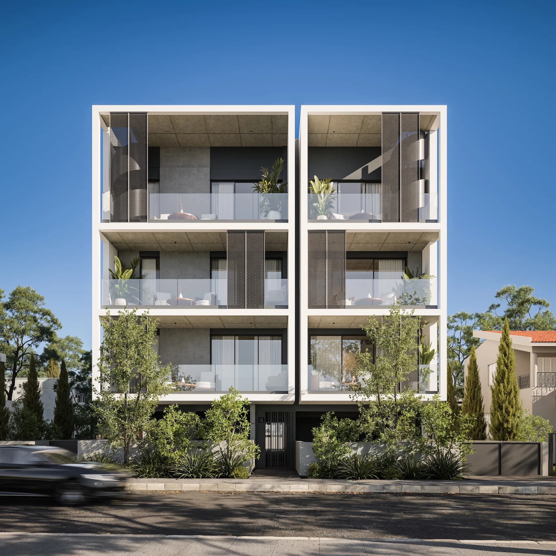 ORAMA's front facade with framed balconies and perforated sliding screens
