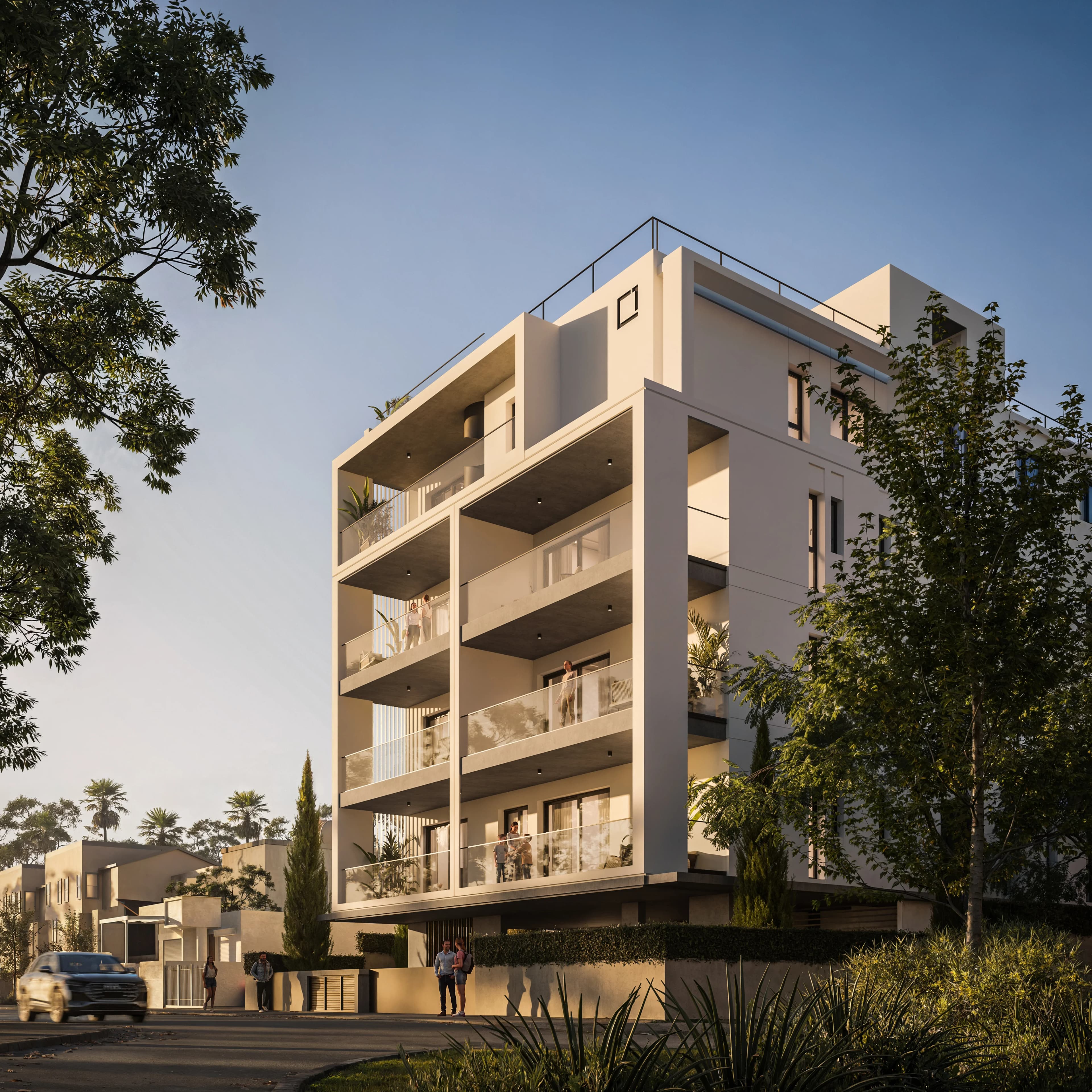 SENA's white facade with deep balconies rising among trees