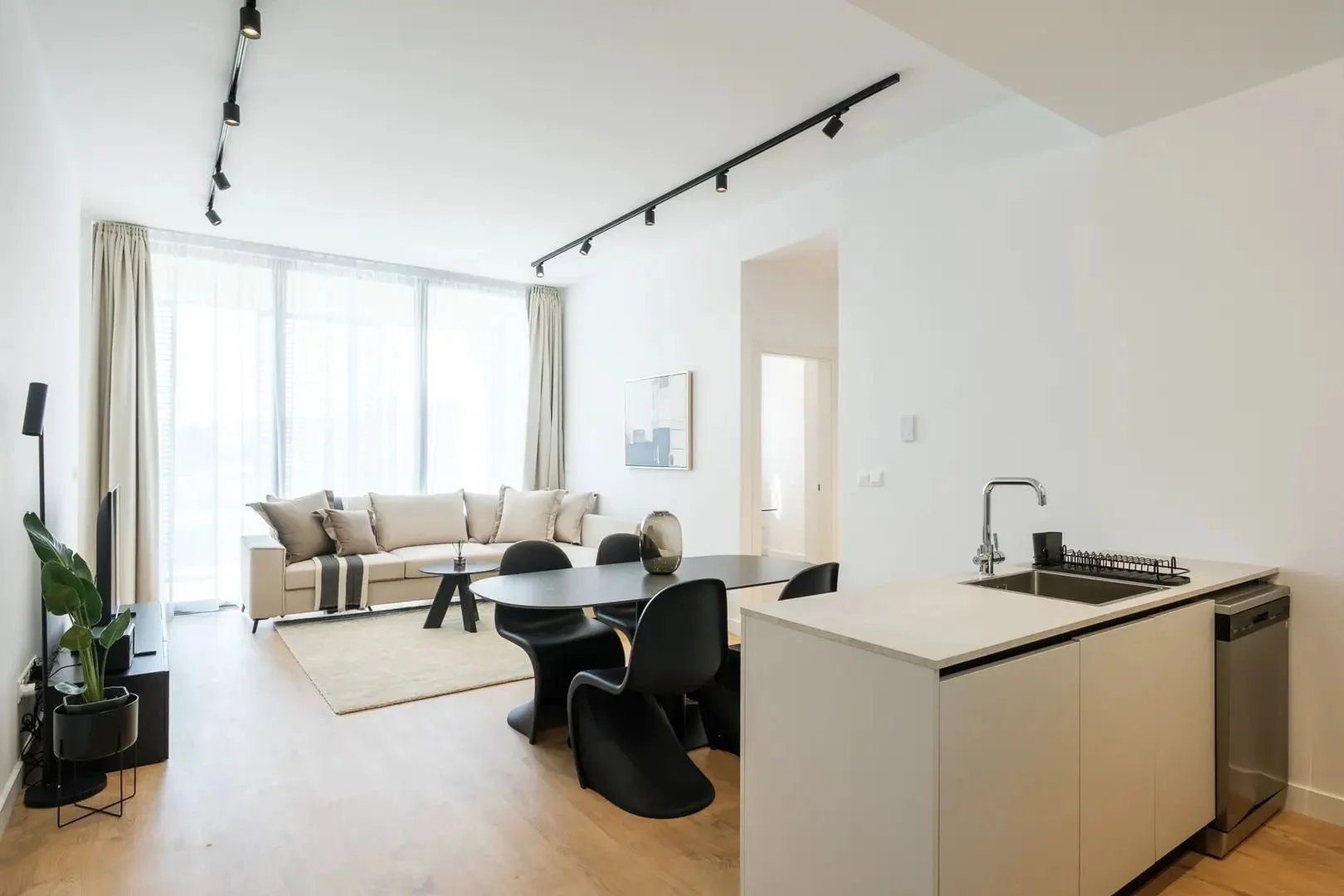 SEQUOIA open-plan living room with a white kitchen island