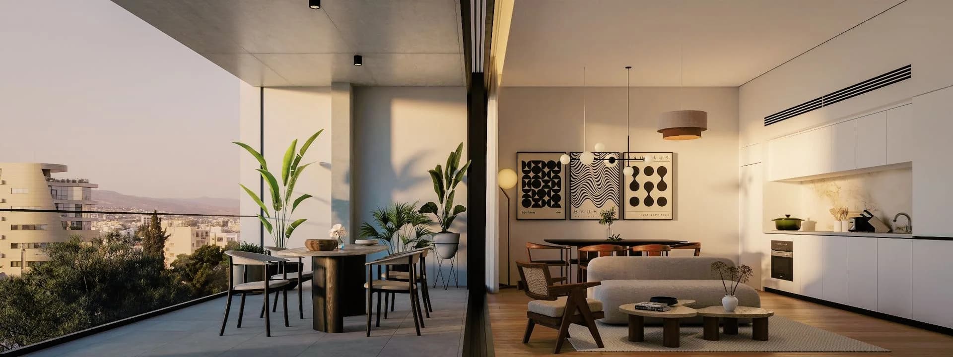 SHANES living and dining room opening onto a balcony at sunset