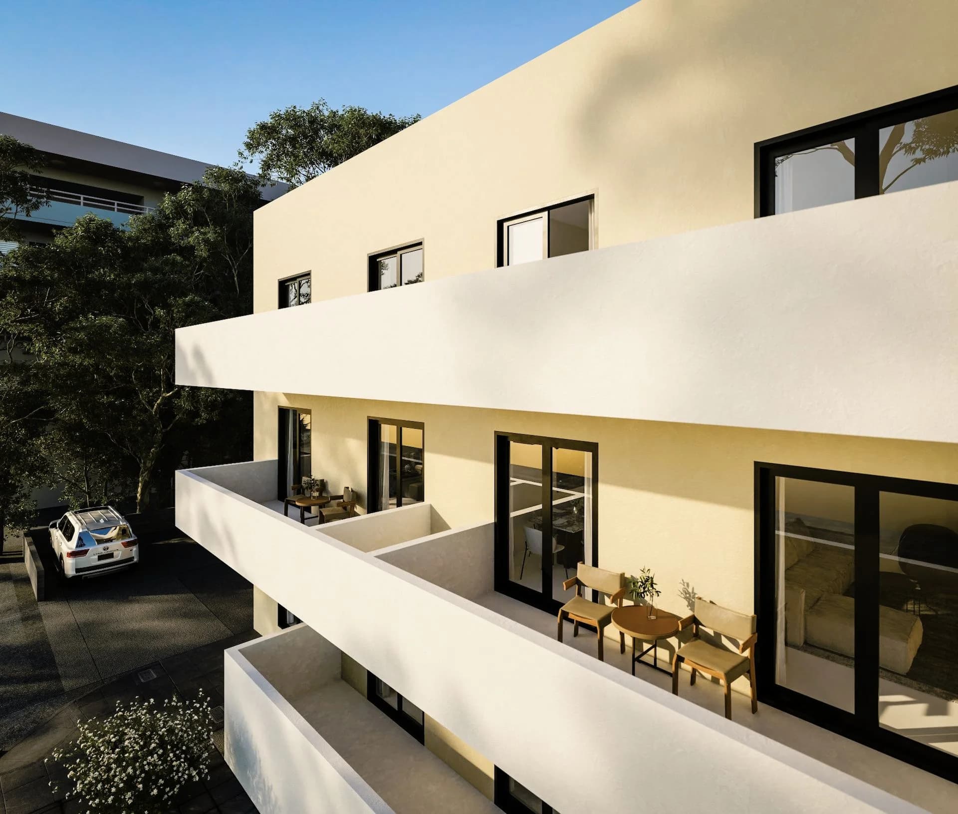 SILENE's deep white balconies above the parking court