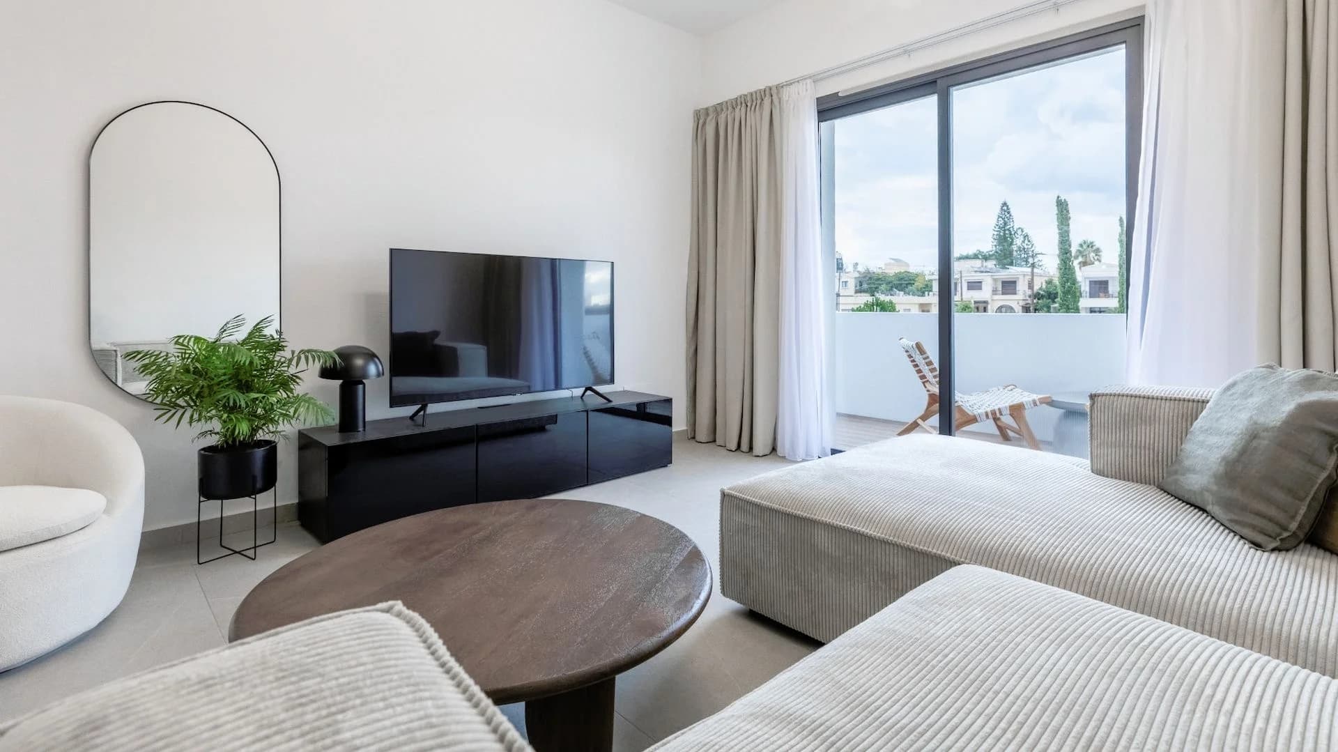 Furnished SILENE living room opening onto a balcony
