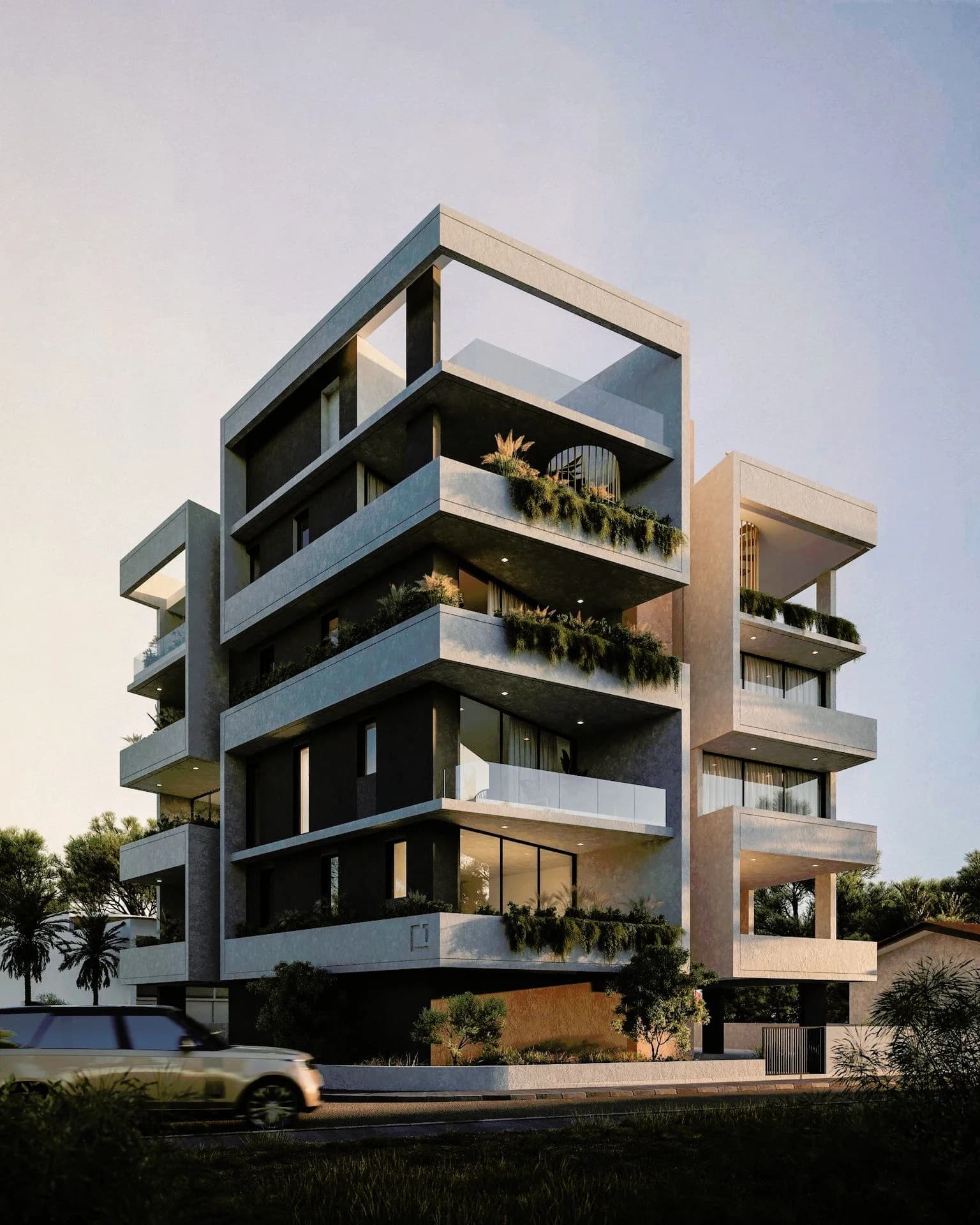 Corner of SOL with layered planted balconies at sunset