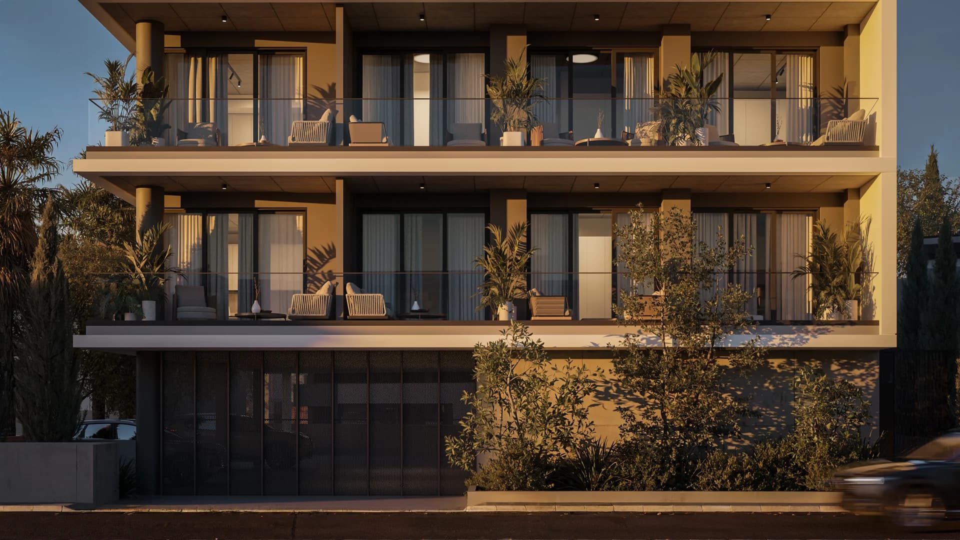 Warm-lit SOLEA balconies above the street in the evening