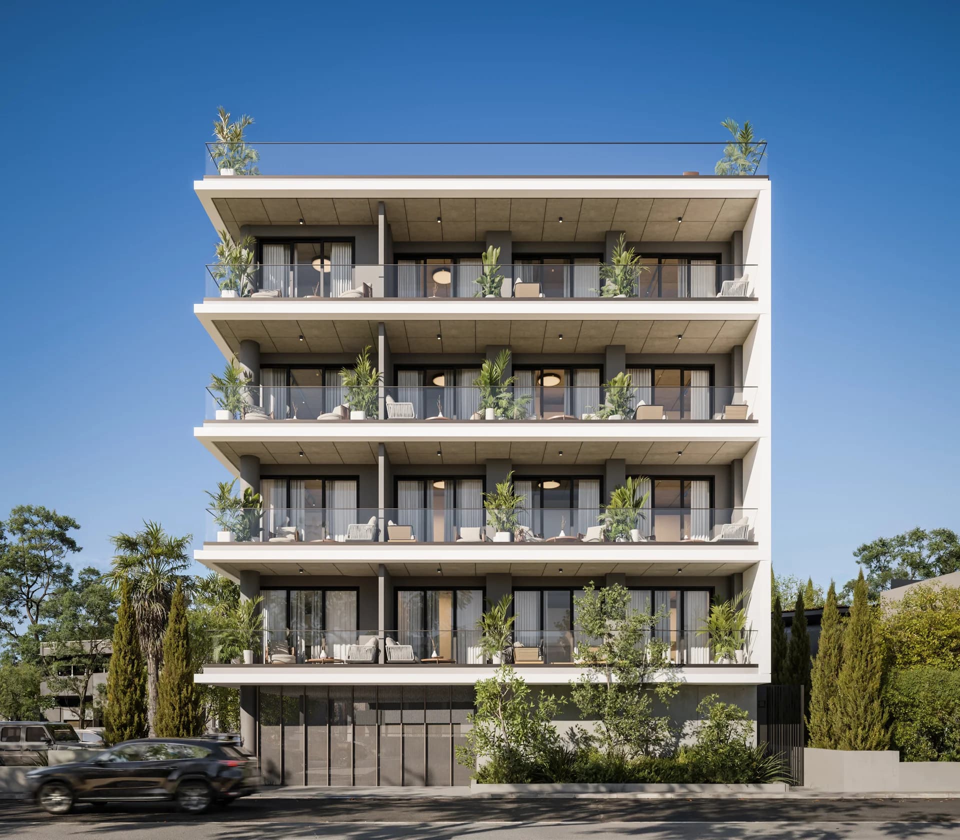 SOLEA's white front facade with planted balconies on every floor