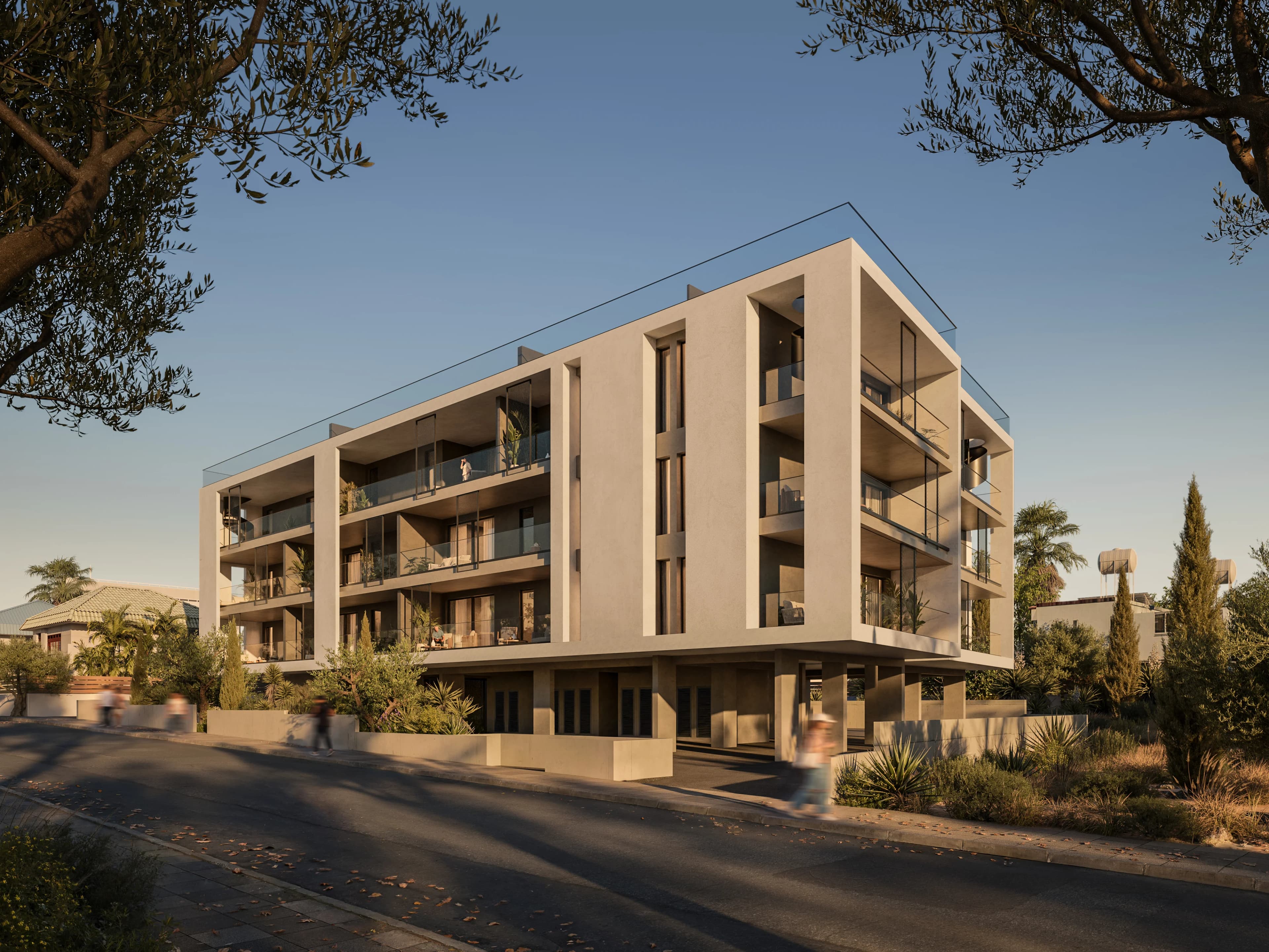 Corner view of LYNEA's three-storey facade with deep balconies and a planted base