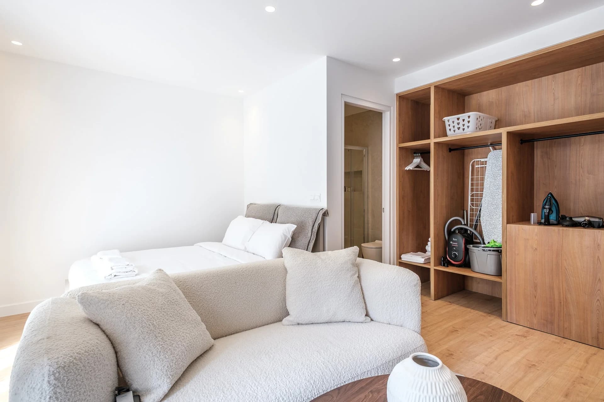 STAY 1 studio bed beside built-in oak storage