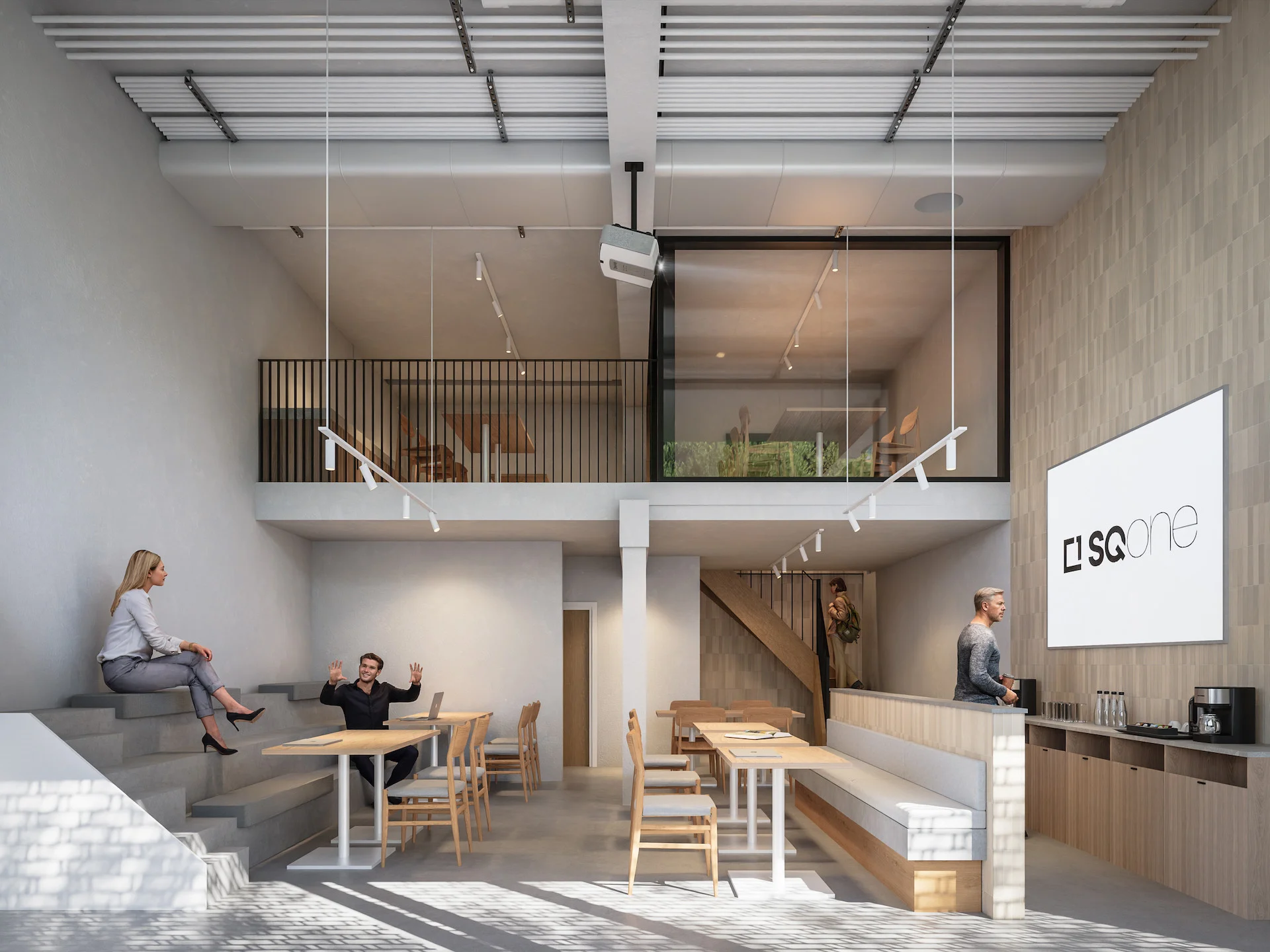 Double-height STAY 4 workspace with a mezzanine and long tables