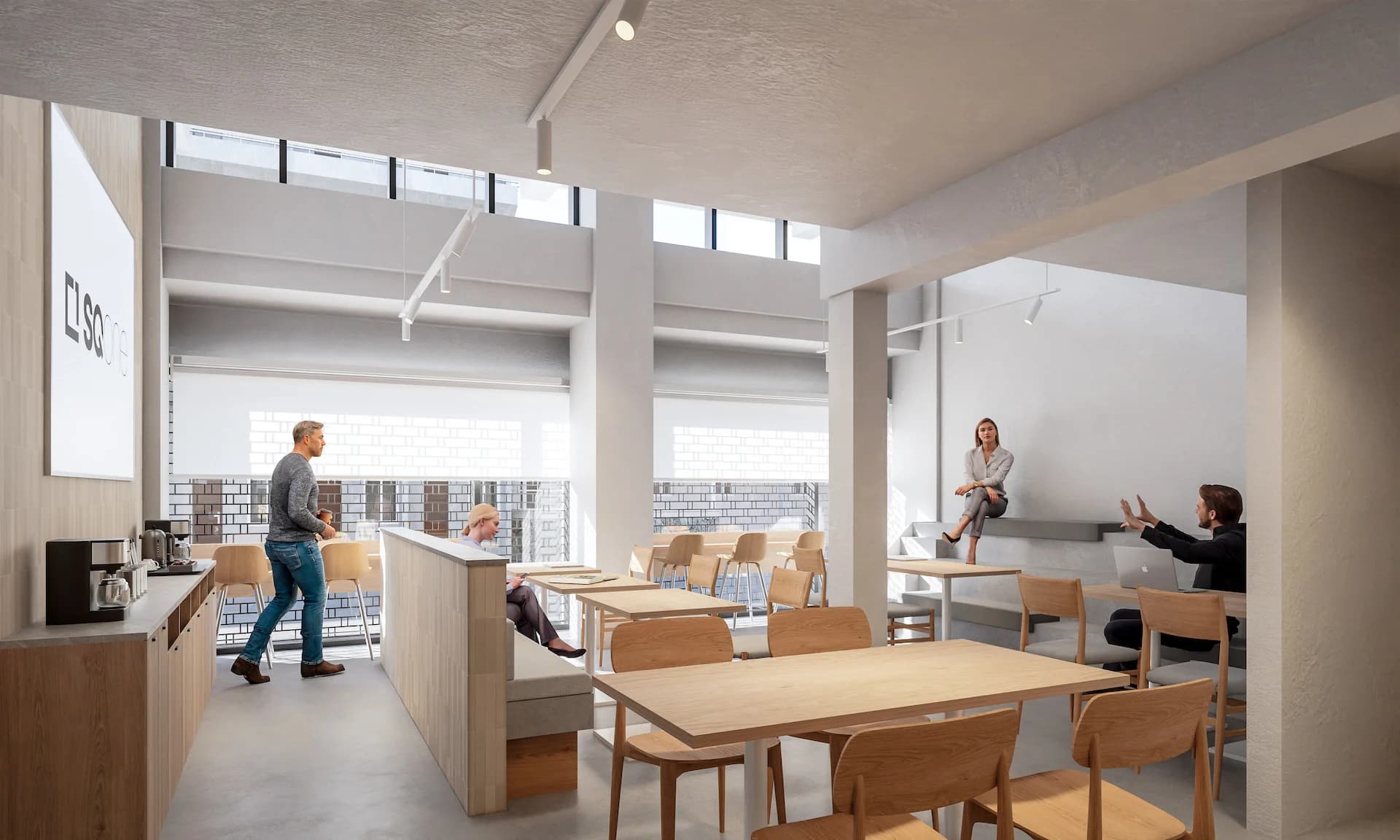 STAY 4 open workspace with a coffee counter and shared tables