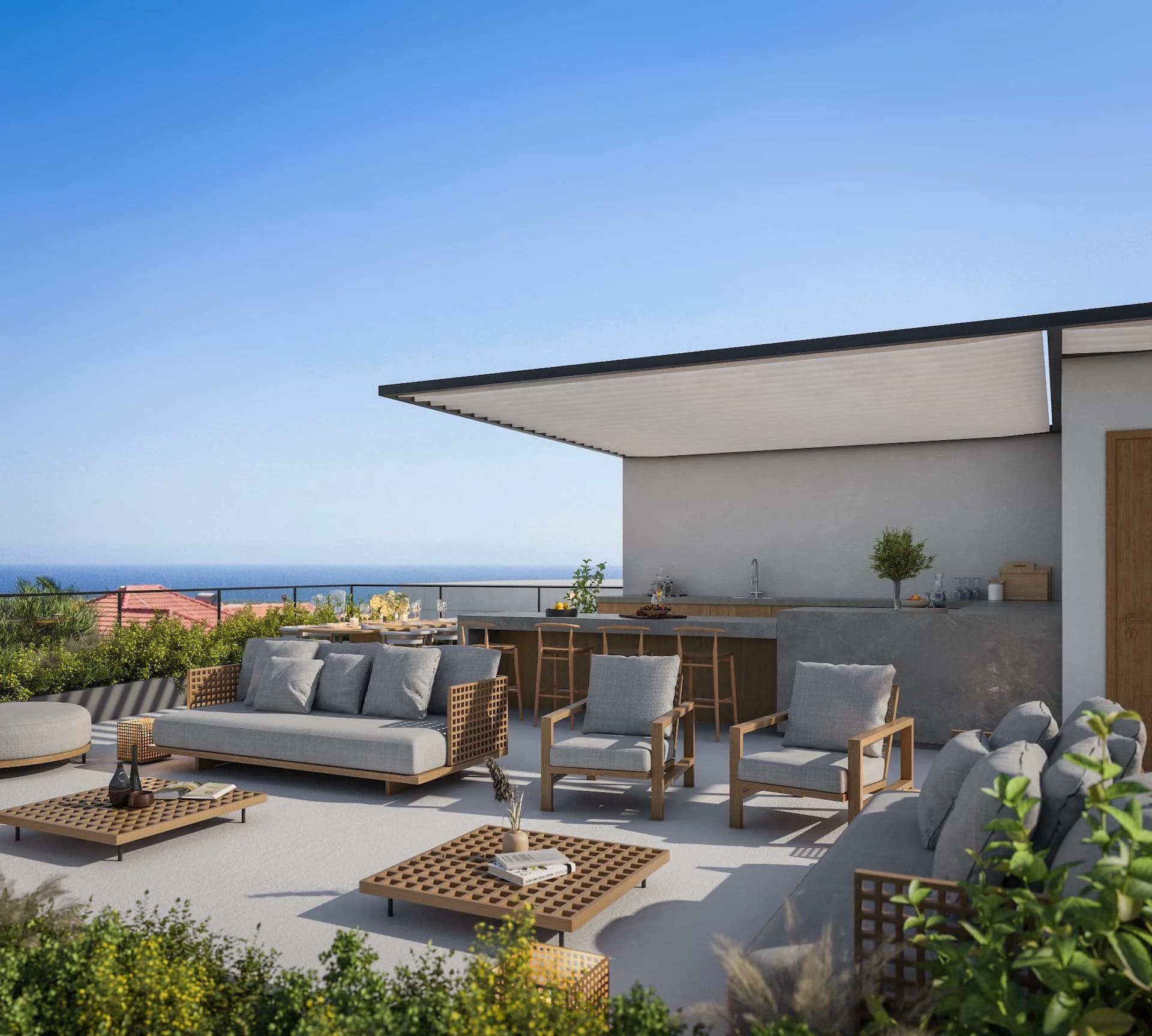 STAY 4 roof terrace with lounge seating and a view to the sea