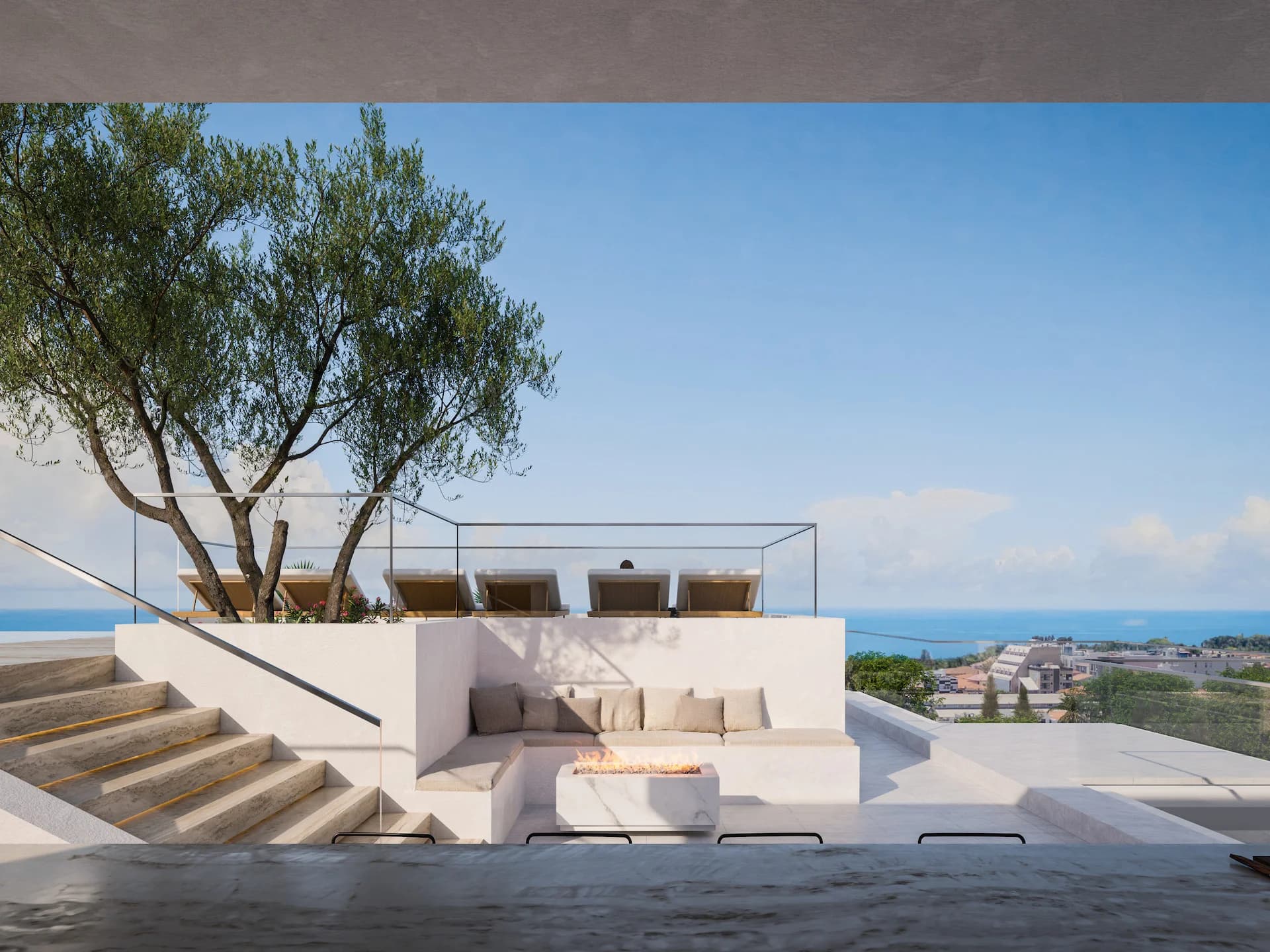 Rooftop lounge at THE COLLECTION with built-in seating and a fire pit