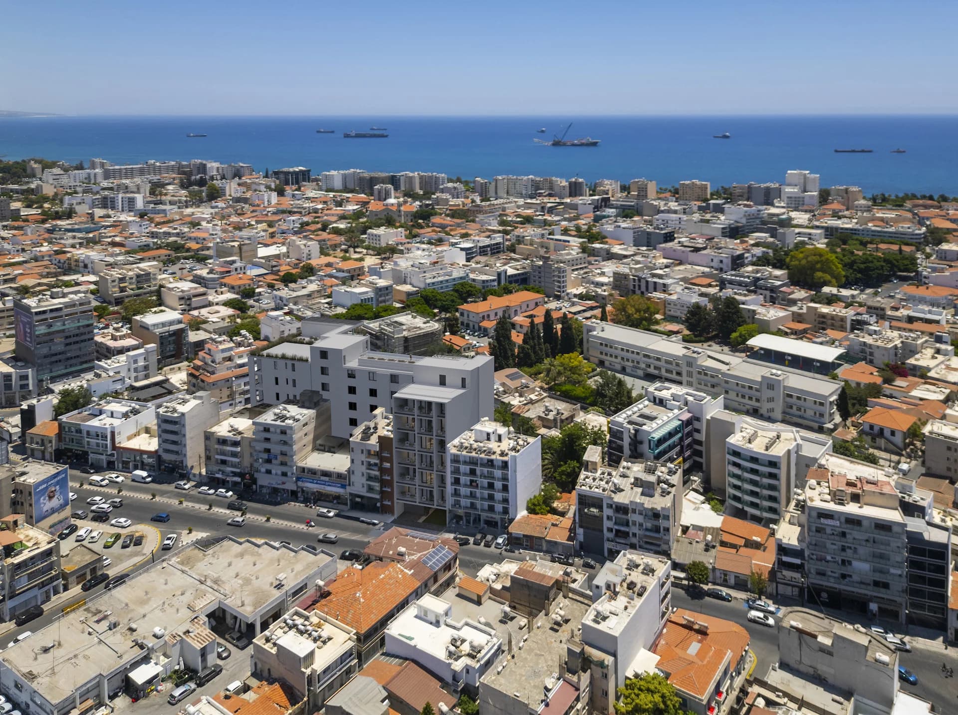 Aerial view of THE COLLECTION in Limassol's historical centre, the old town running down to the sea