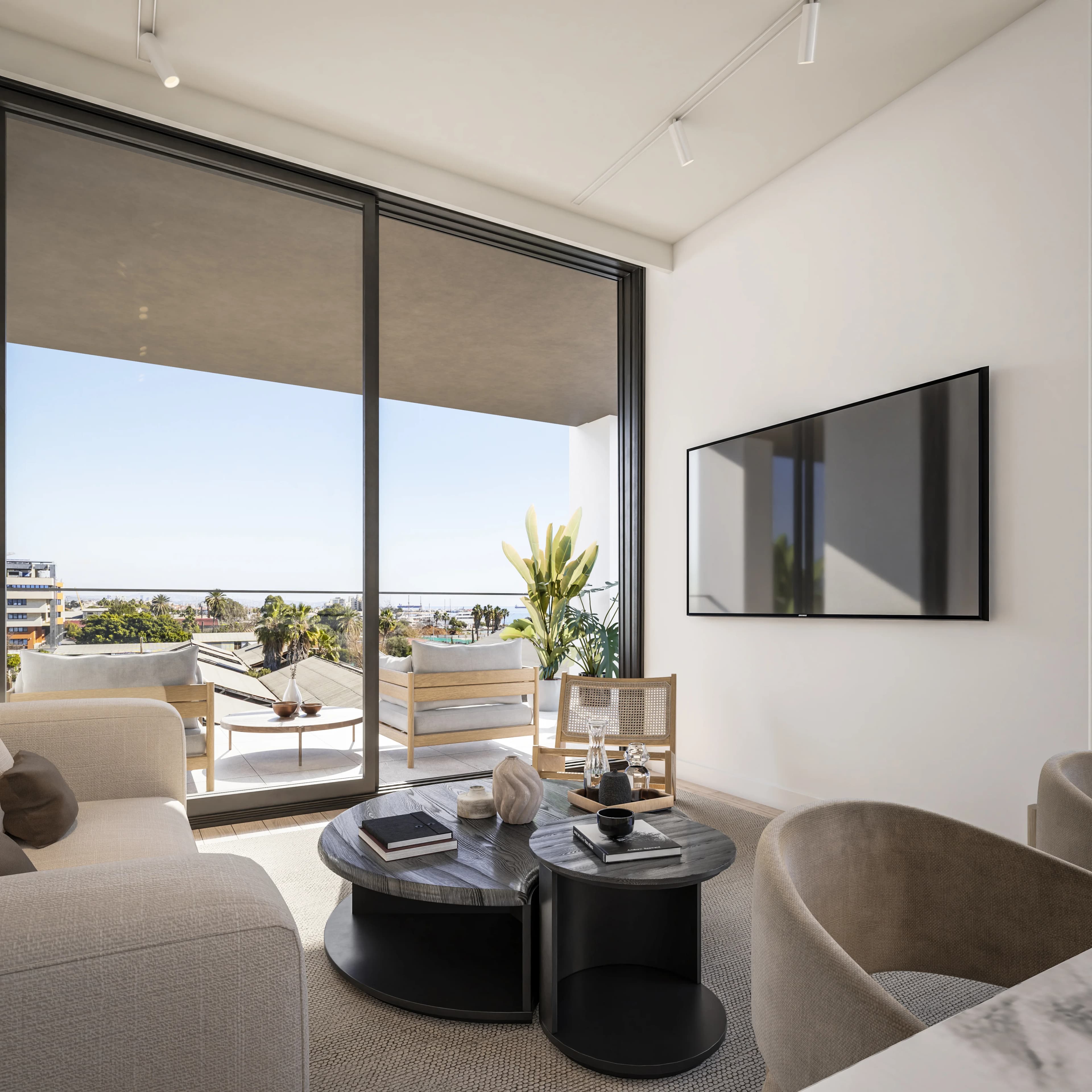 THE DOCKS living room opening onto a balcony with rooftop and sea views