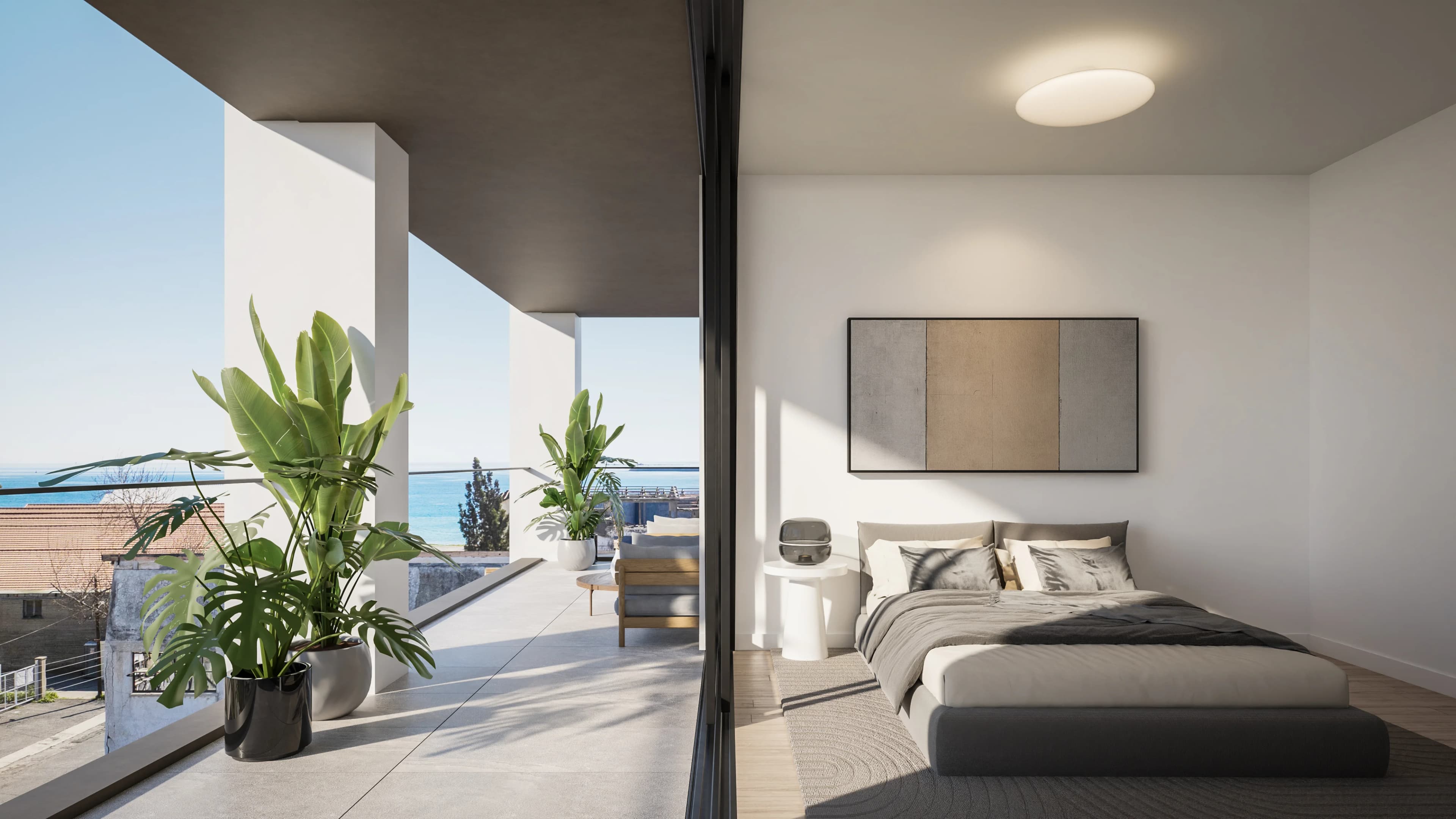 THE DOCKS bedroom opening onto a planted terrace with a sea view