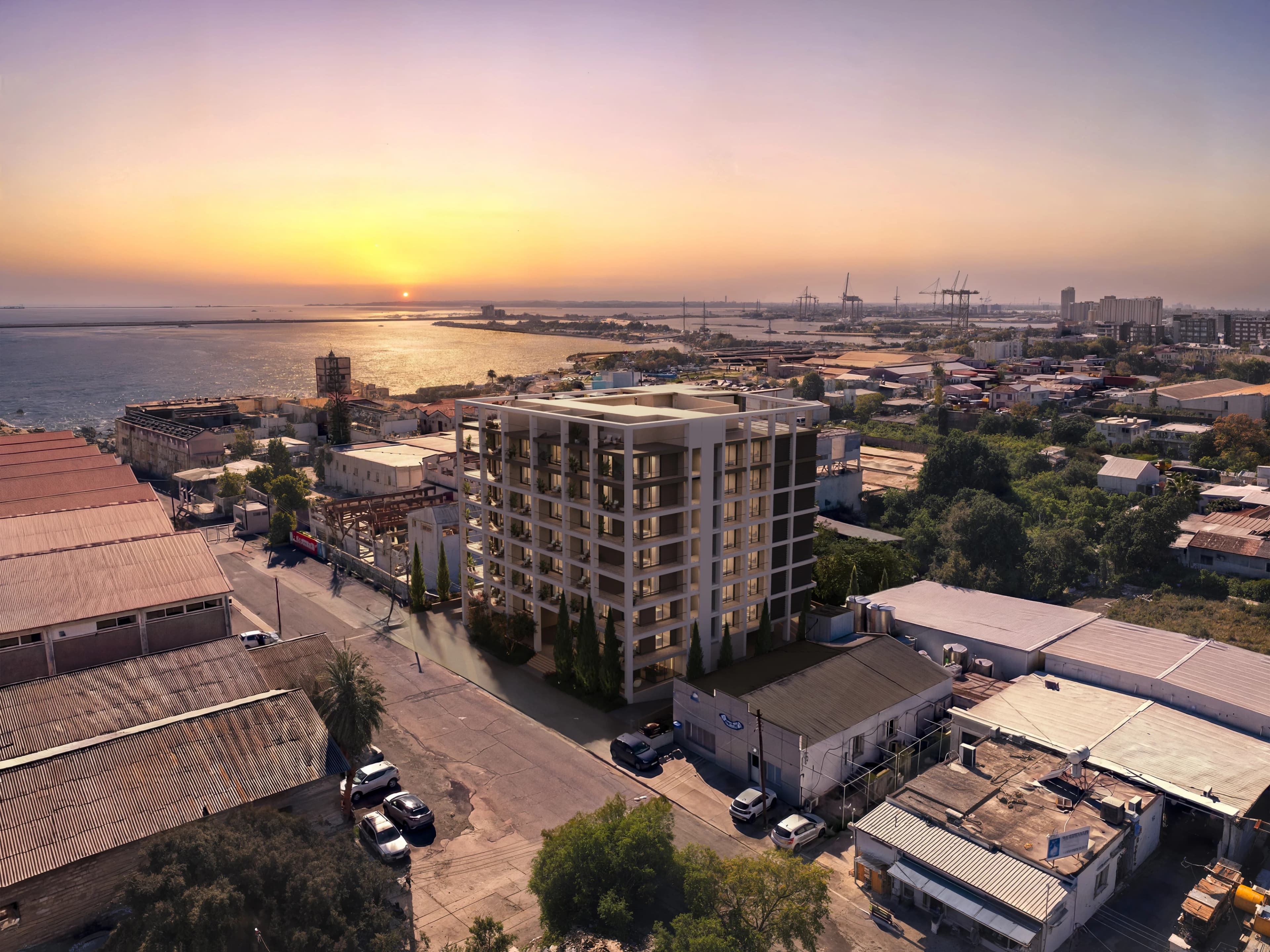 Aerial view of THE DOCKS at sunset in Tsiflikoudia, with Limassol's harbour and the sea beyond