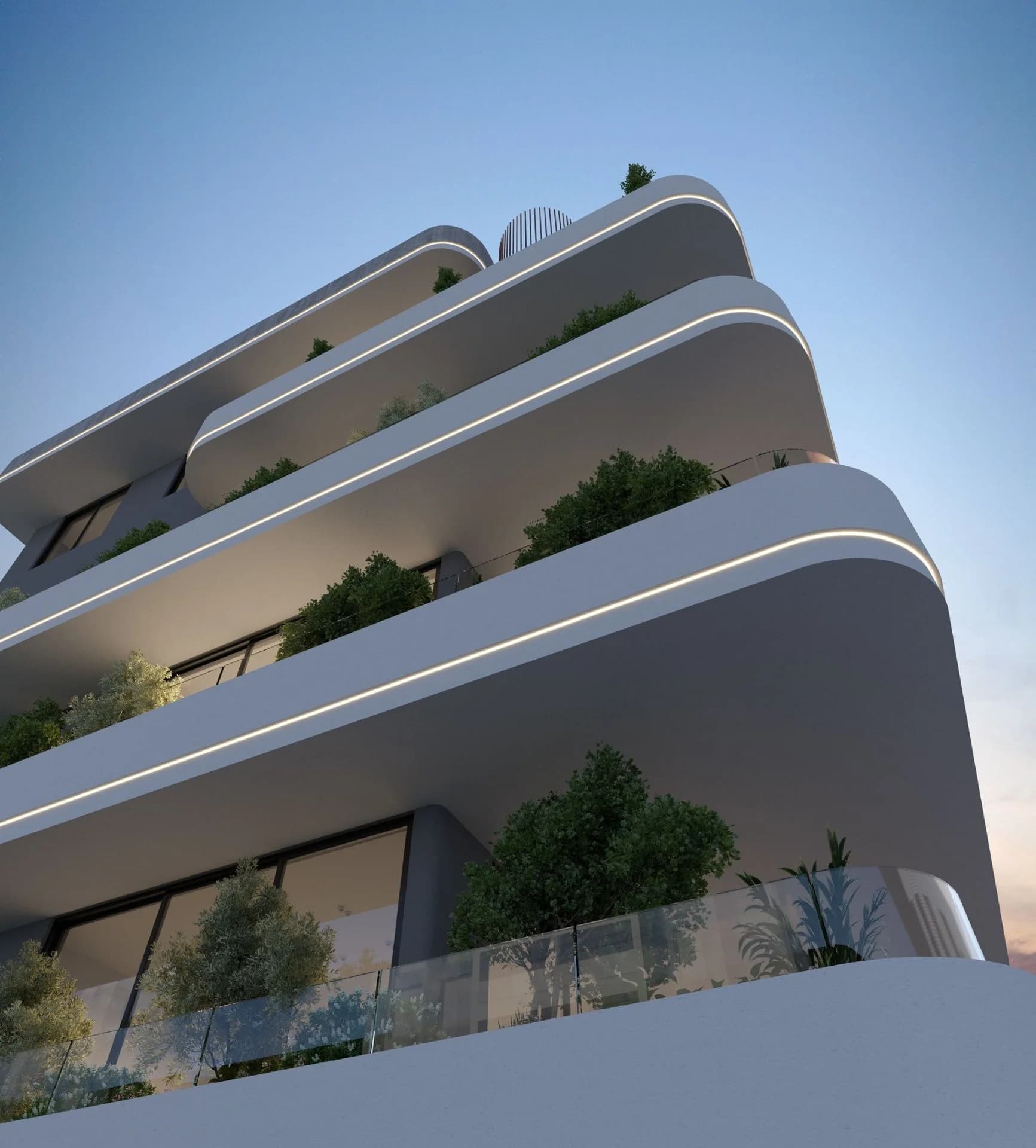 Looking up at UKIYO's curved balconies lit along their edges