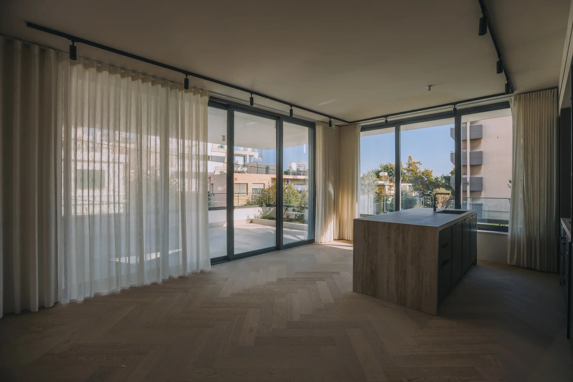 Open-plan UKIYO apartment opening onto a terrace above Agia Zoni
