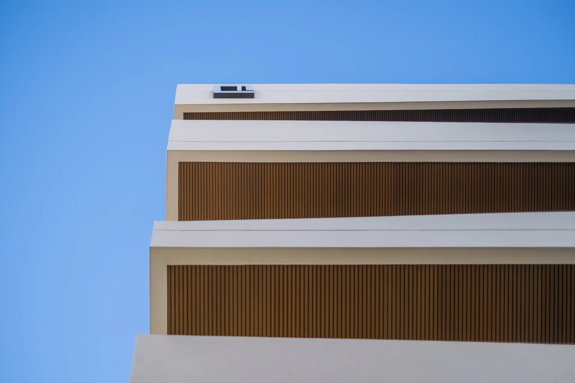 URBN's top floors with timber-slatted fronts
