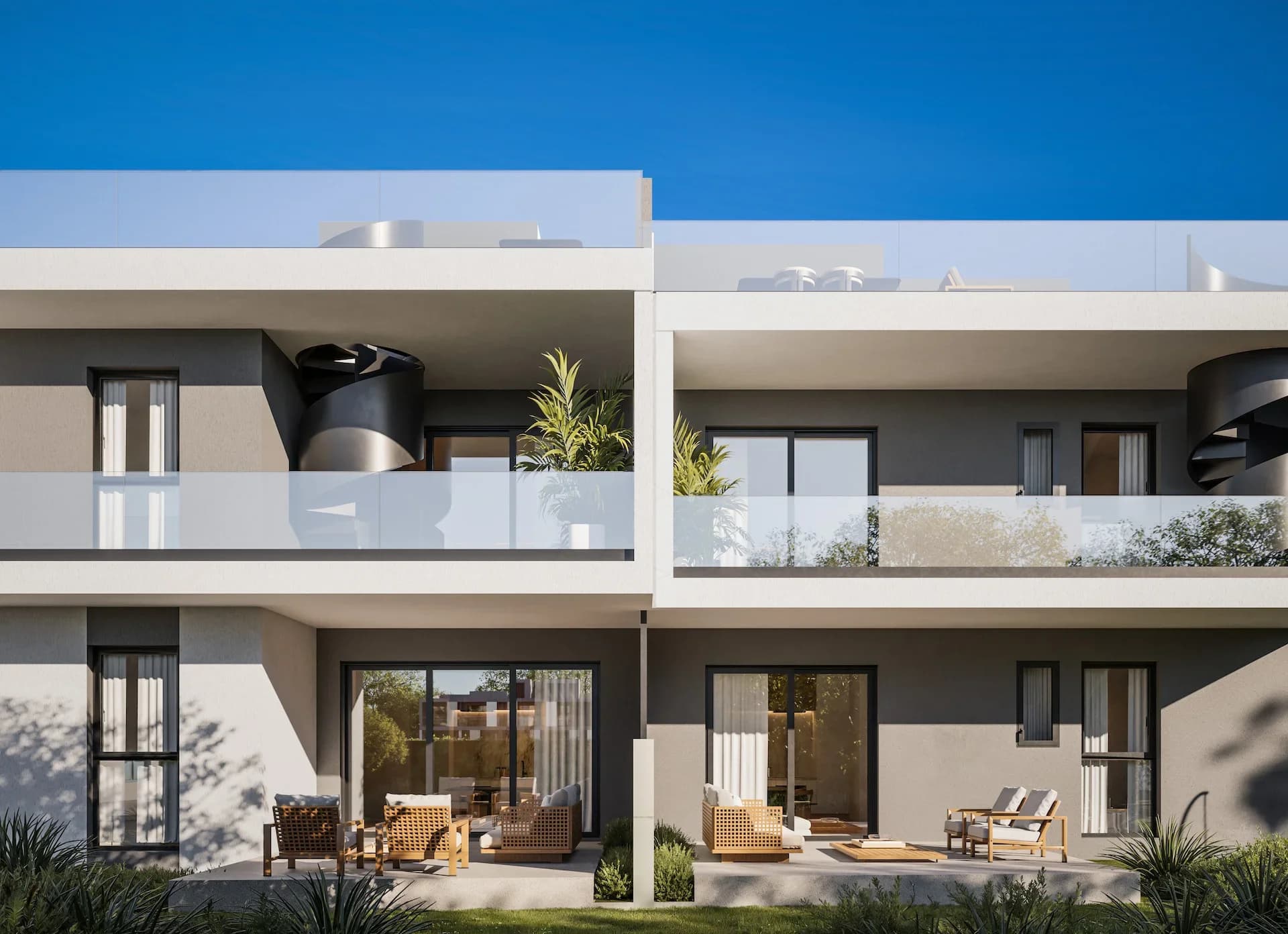 ZAYA balconies with glass railings and black spiral stairs