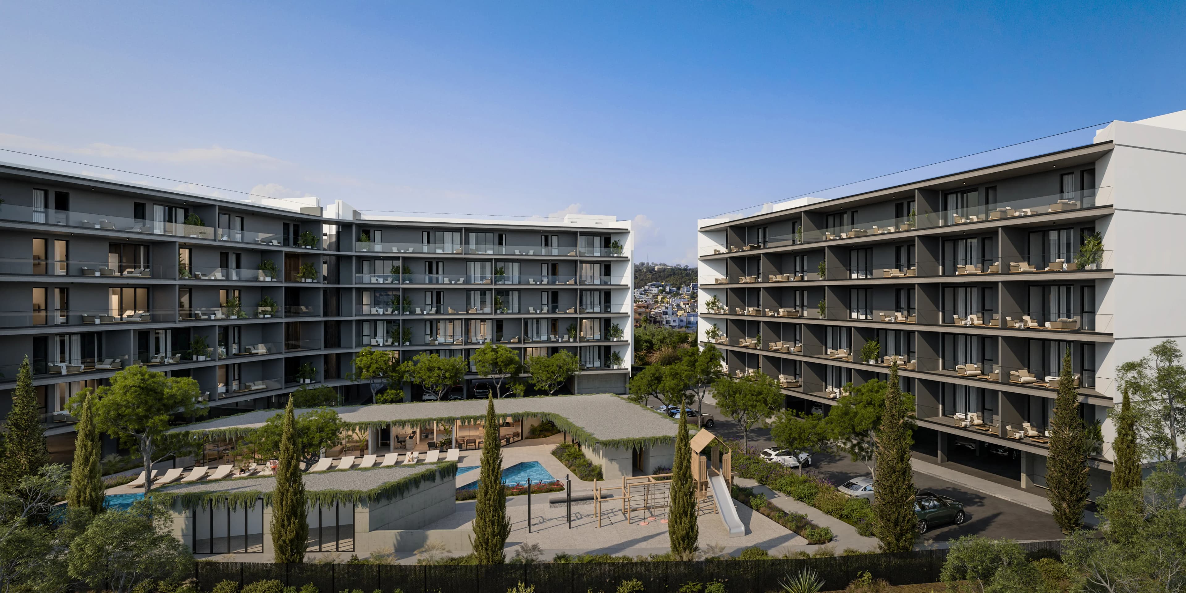 ZOIA's two five-storey blocks around a garden with a pool and playground