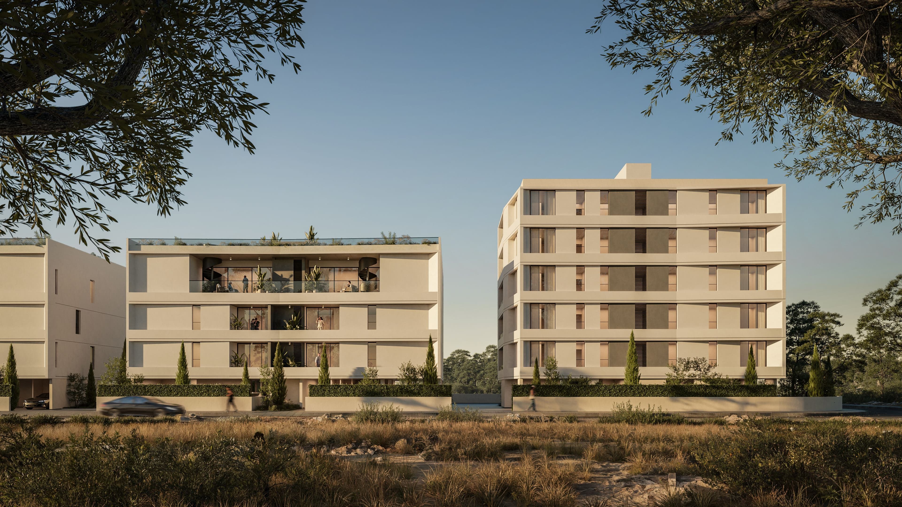 Two ARYA blocks with roof gardens at sunset